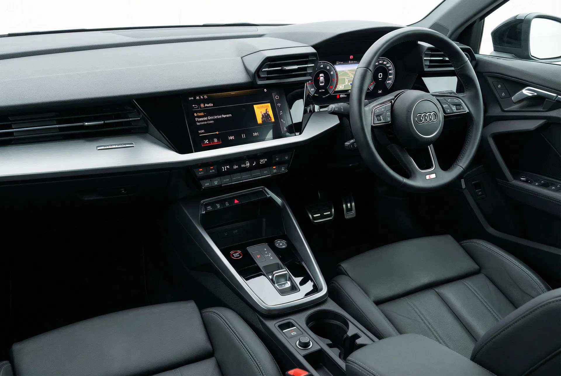 Audi A3 interior showing the MMI infotainment system with touchscreen