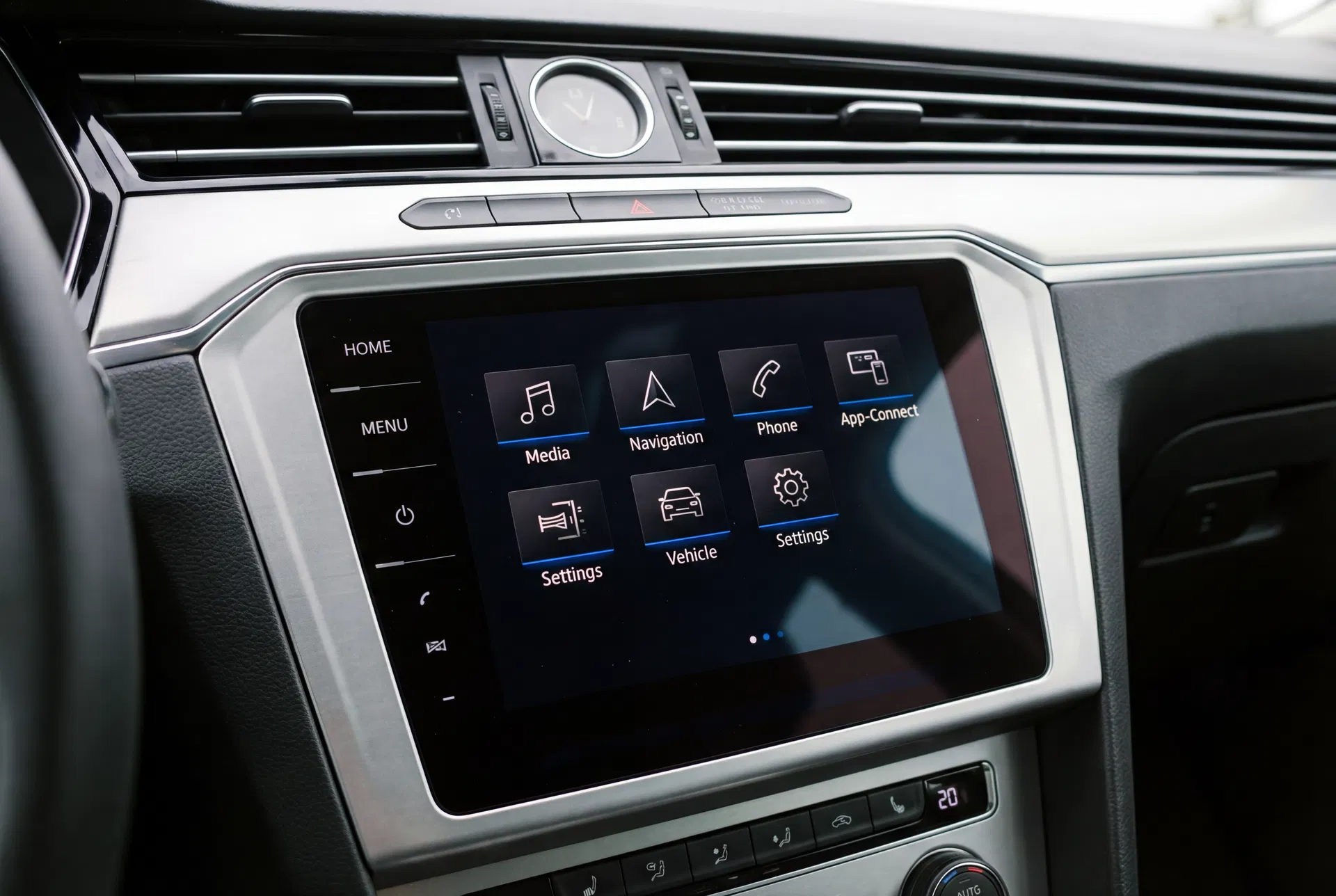 Volkswagen MIB2 touchscreen showing the home menu with media and navigation tiles