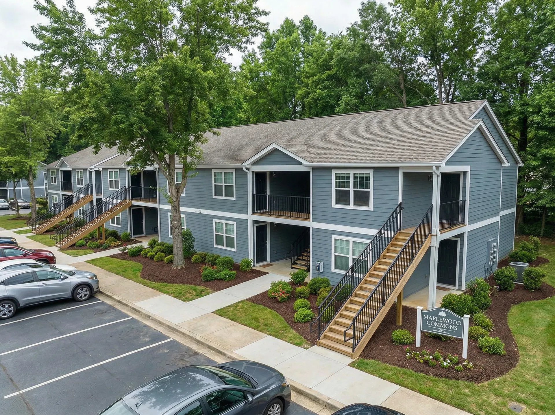 Build Wiser field leadership reviewing plans at a multi-family property