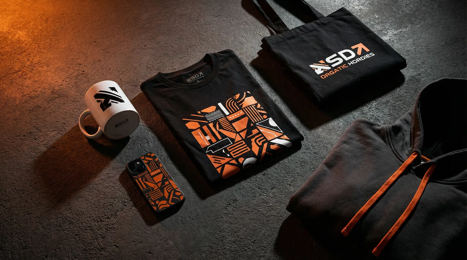 Showcase of custom printed merchandise including t-shirts, hoodies, and accessories