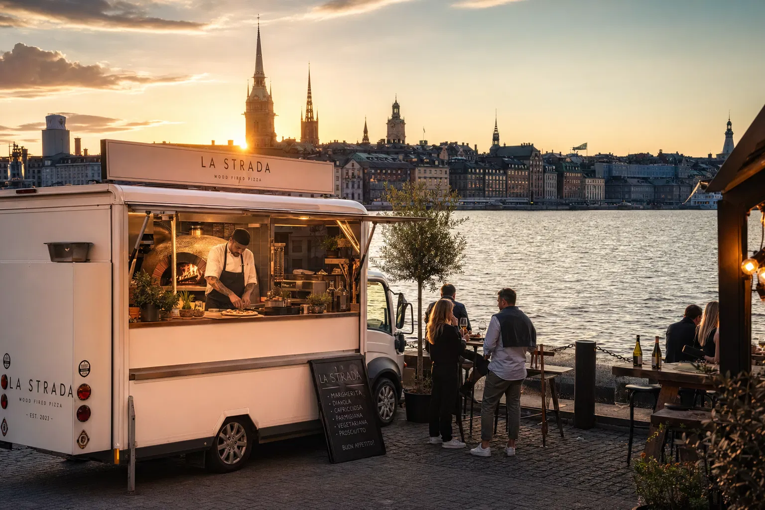 Pizza food truck on Stockholm waterfront at sunset