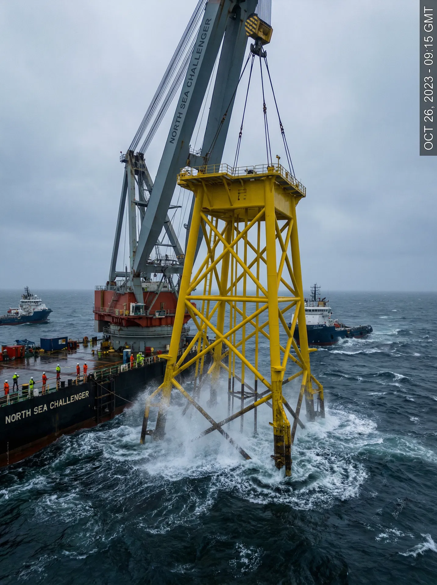 Jacket foundation structure being lowered into the North Sea by heavy-lift crane vessel