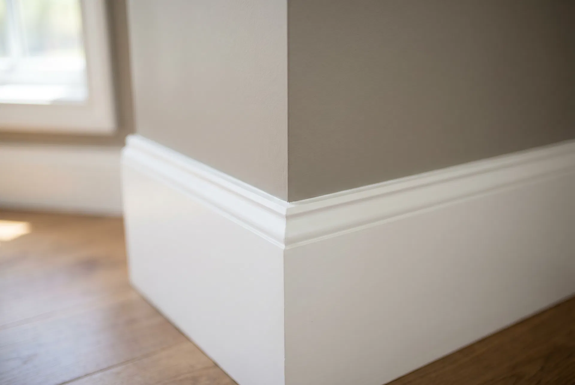 Crisp painted trim and baseboard detail