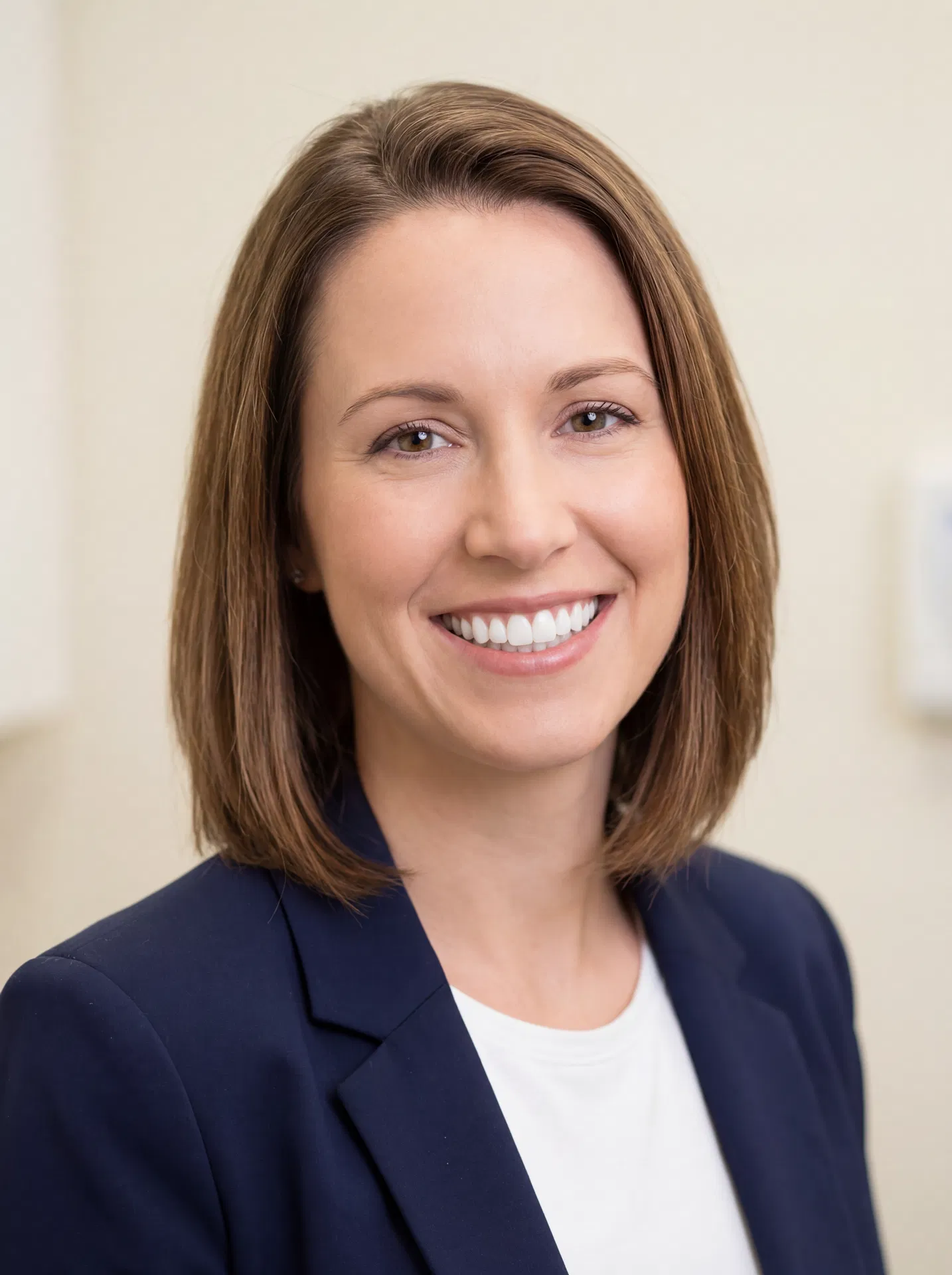 Professional woman with a radiant bright white smile after take-home teeth whitening treatment