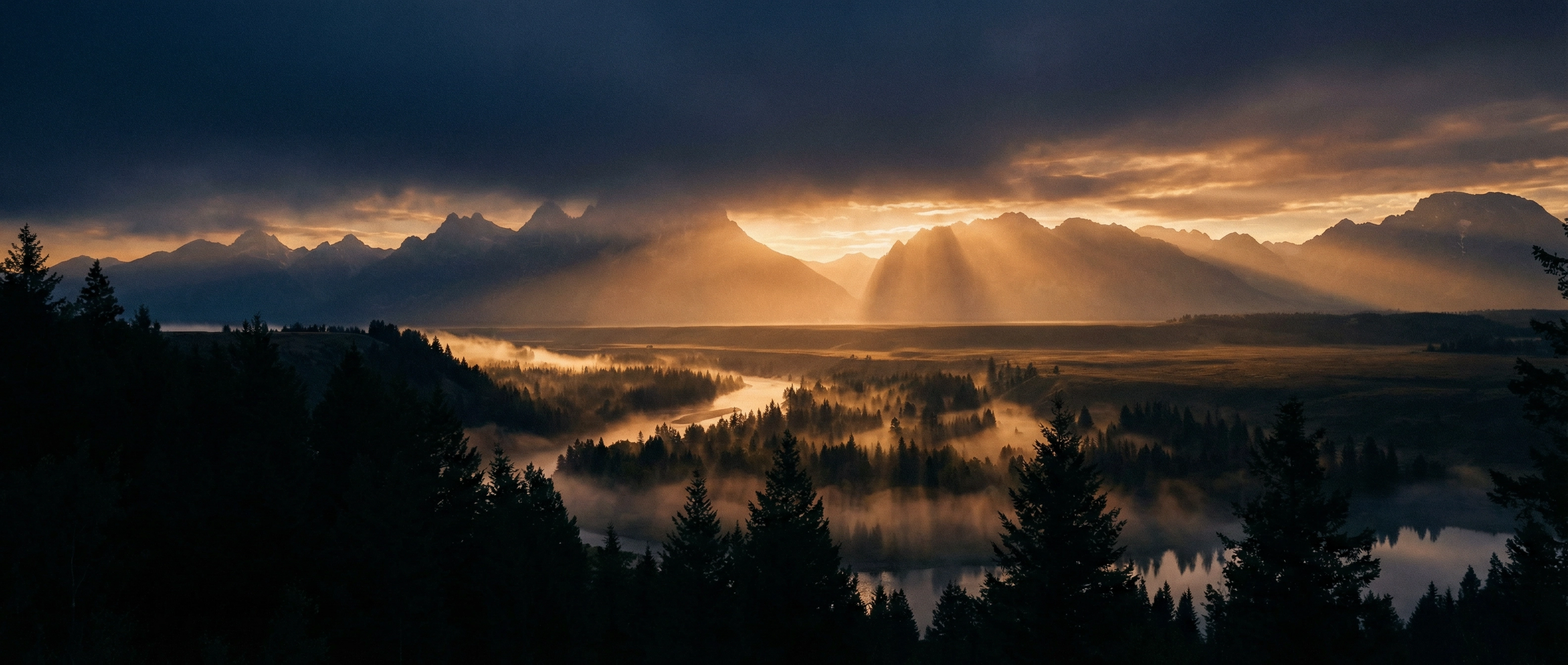 Golden sunrise over mountain landscape