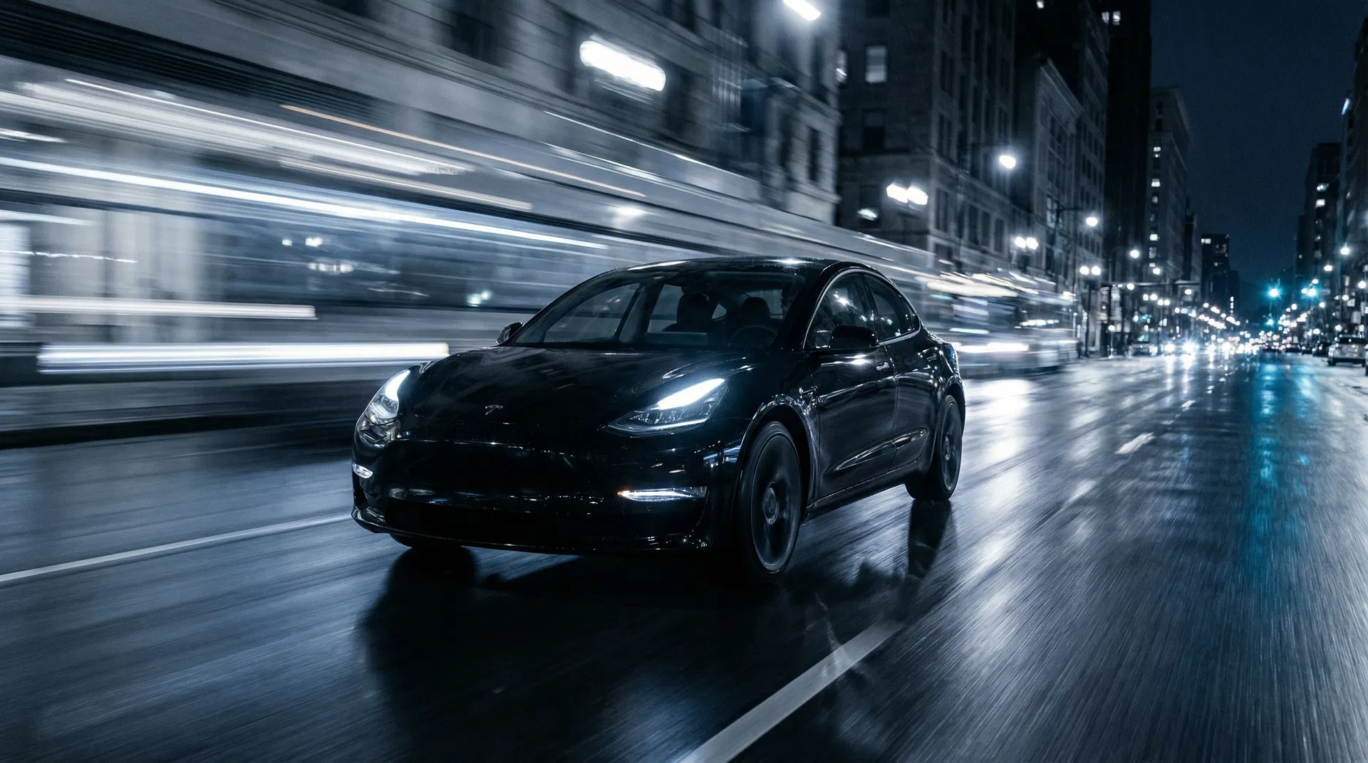 Tesla Model 3 driving at night