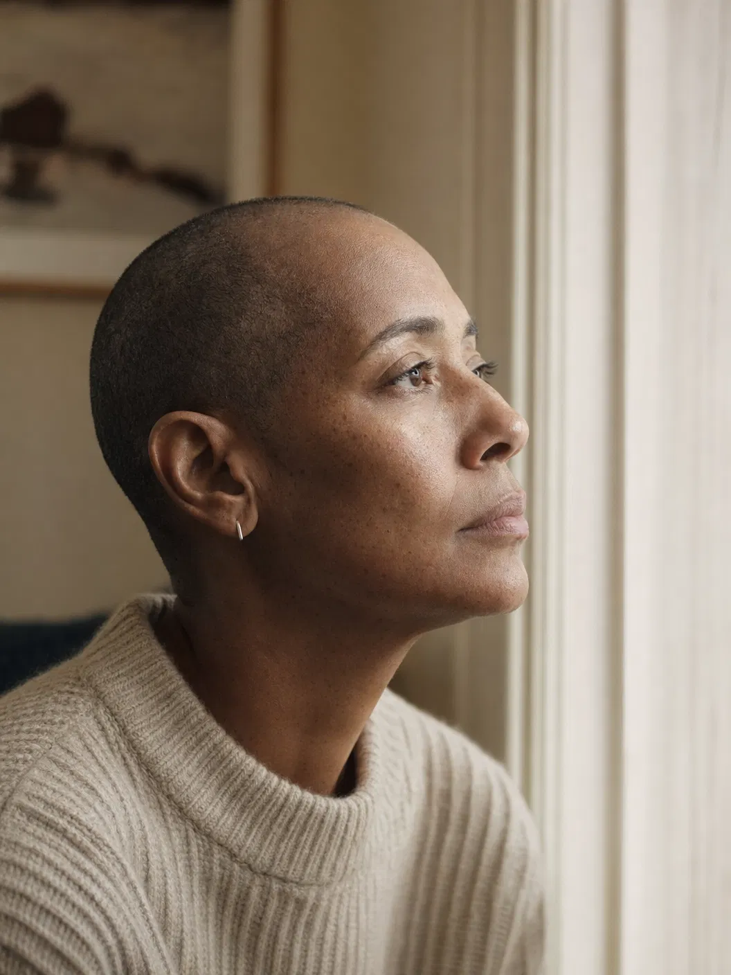A contemplative patient by a window
