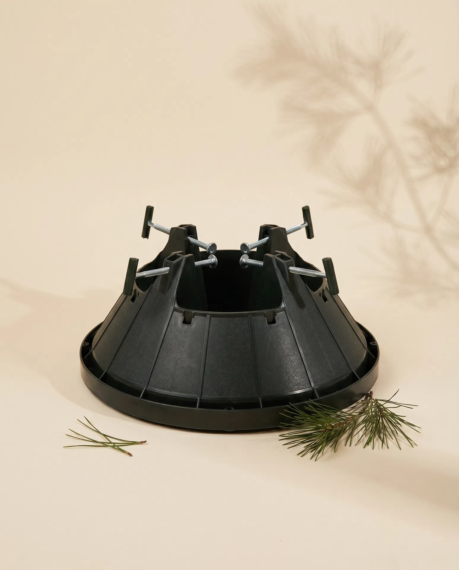 Example of the water-reservoir Christmas tree stands stocked by the farm