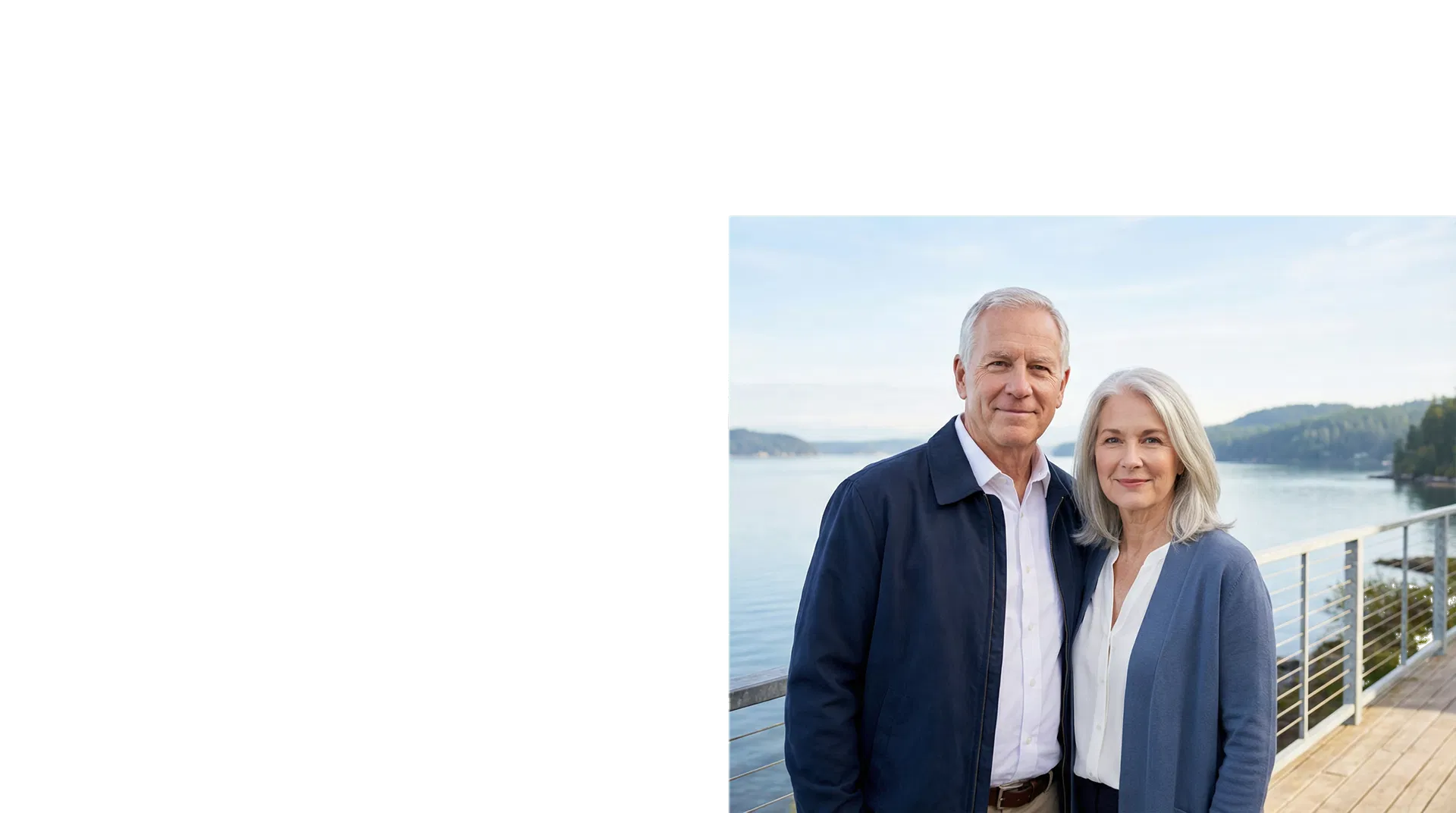 Senior couple standing by the water in a calm Pacific Northwest setting