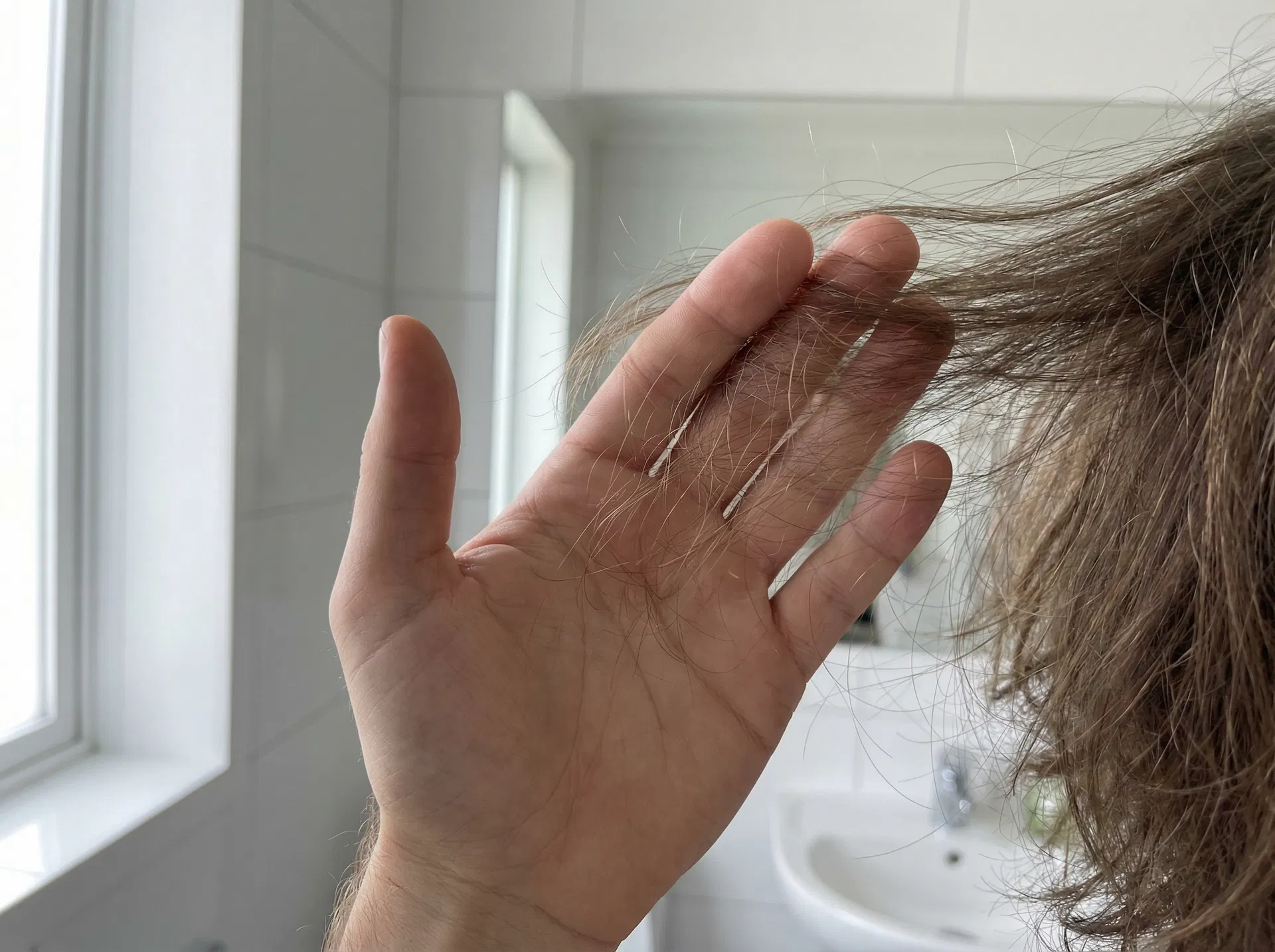 Dünne Haarsträhnen