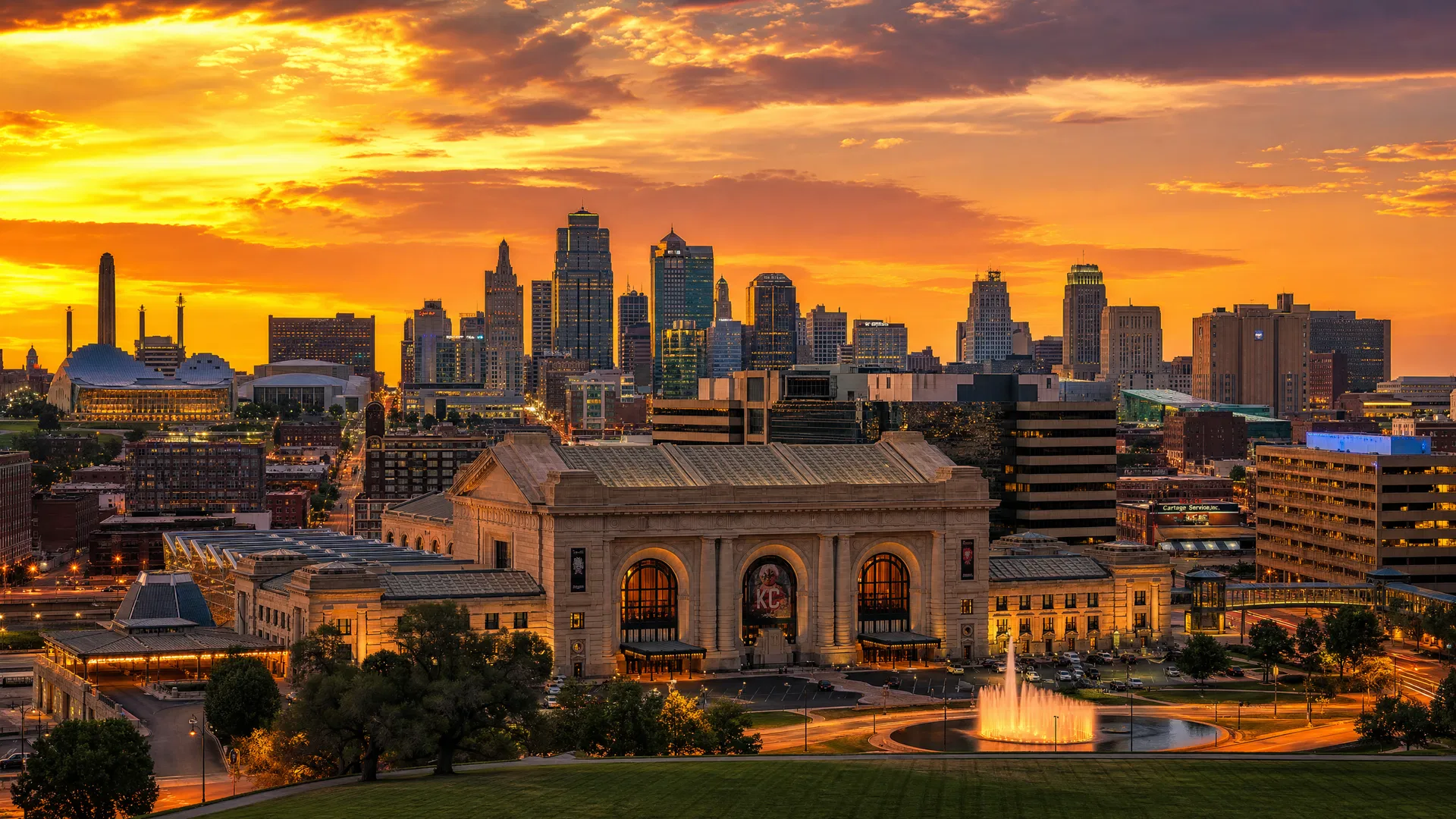 Kansas City skyline at golden hour with Union Station in the foreground