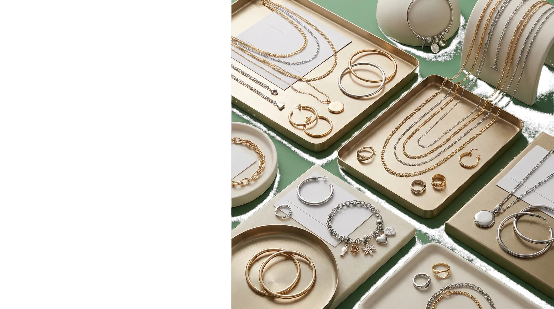 Gold plated and silver plated jewellery arranged in a luxury wholesale showroom composition
