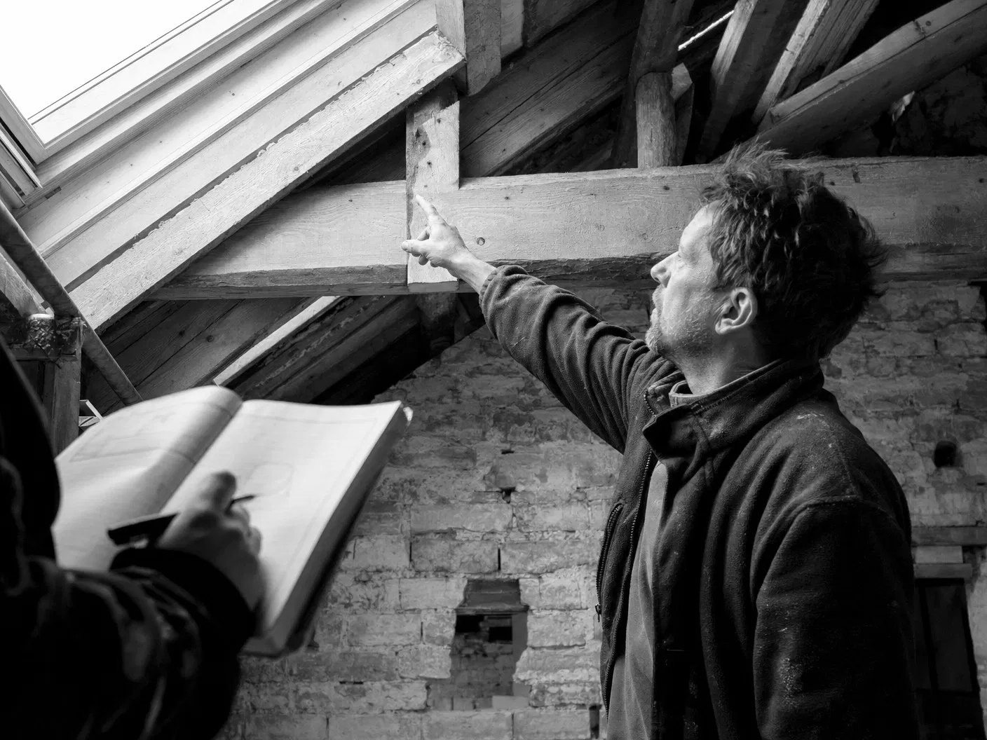 Black and white site inspection in a loft