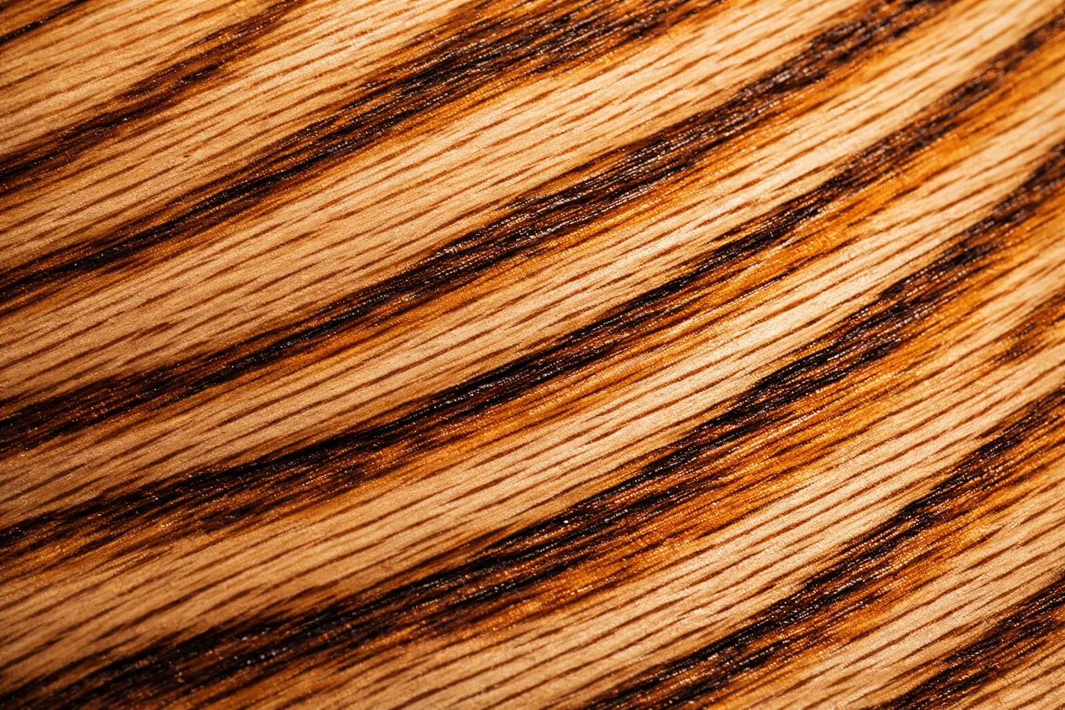 Close-up of white oak wood grain on a pintail skateboard deck