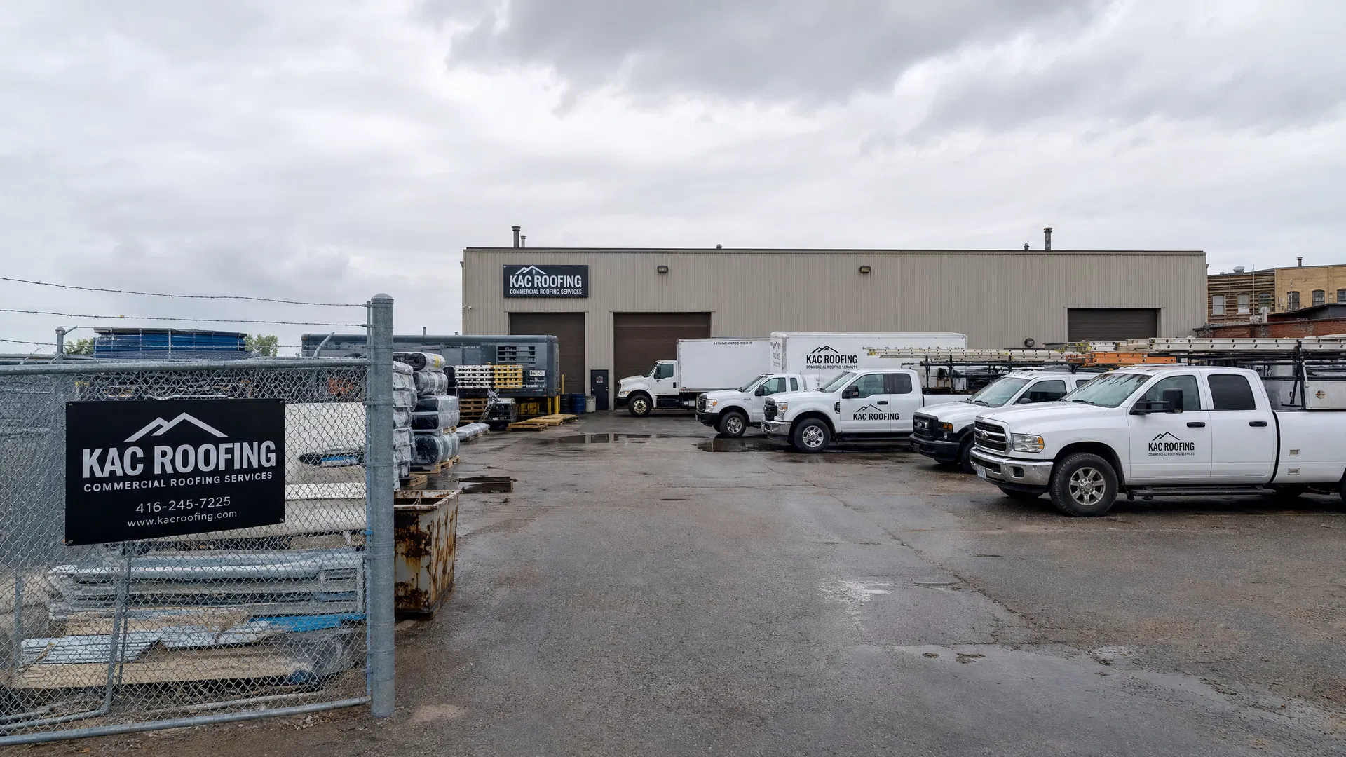 Industrial yard with roofing trucks and equipment — Etobicoke, GTA