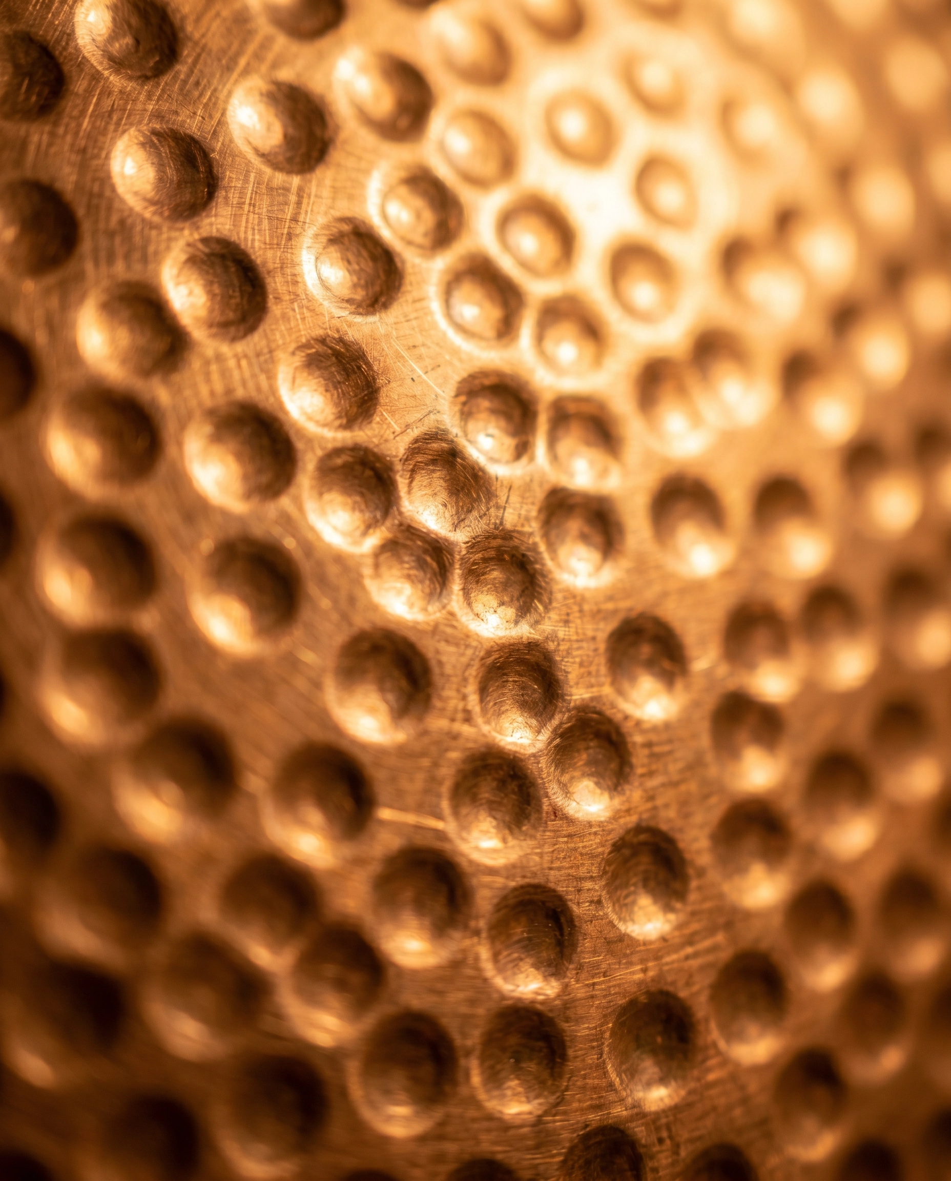 Hammered copper textured surface