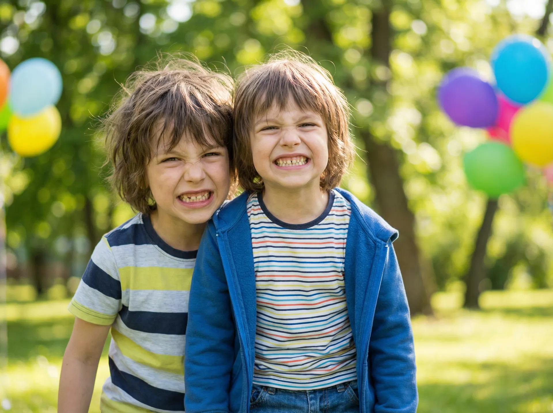 Happy kids smiling — the joy of giving back