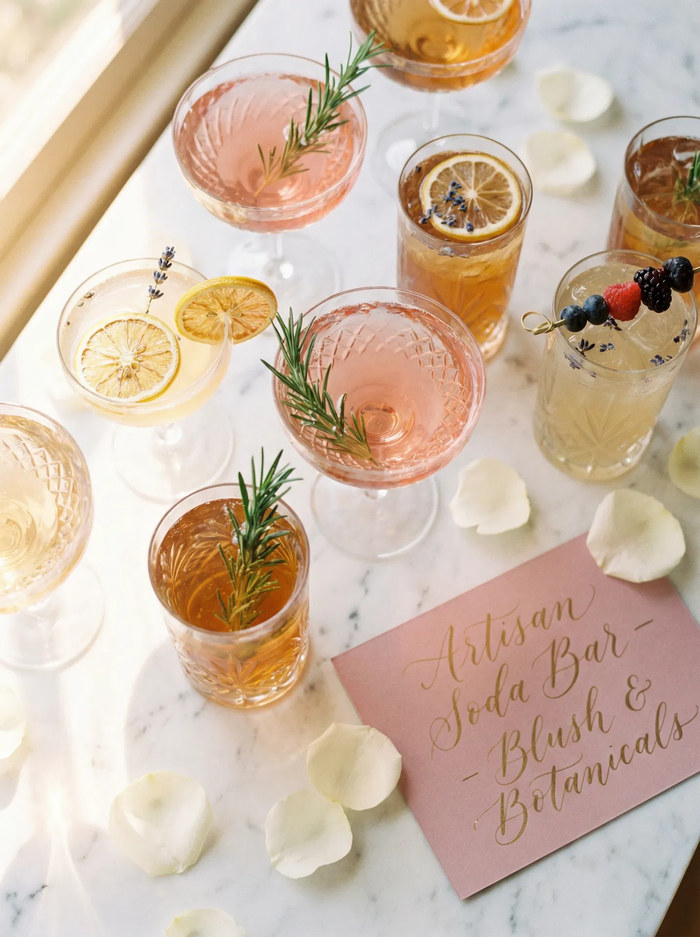 Artisan dirty soda drinks in crystal glasses