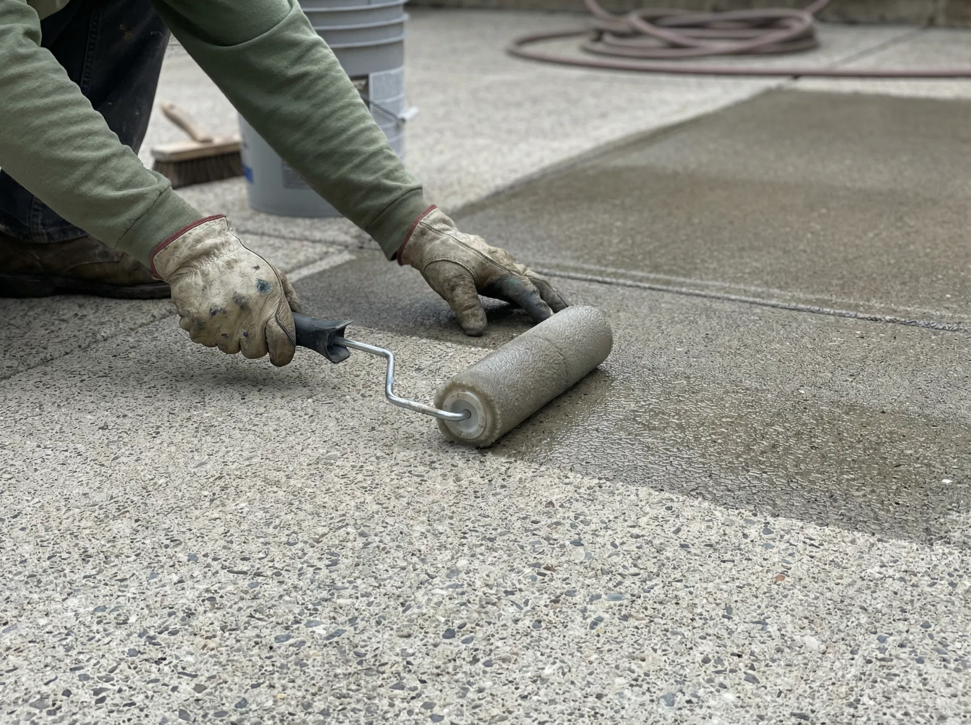 Applying a protective concrete seal to a freshly cleaned surface