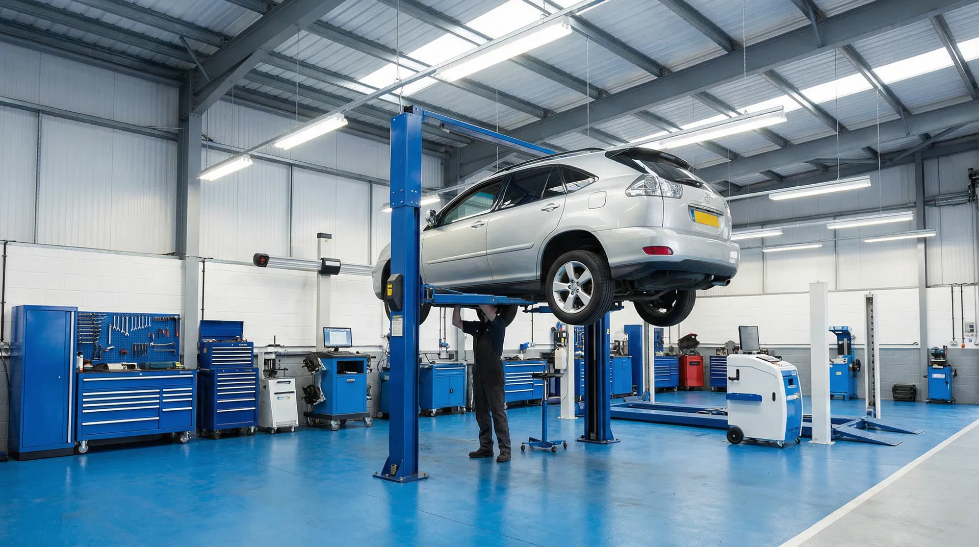 Auto repair shop with vehicle on lift — garage liability insurance