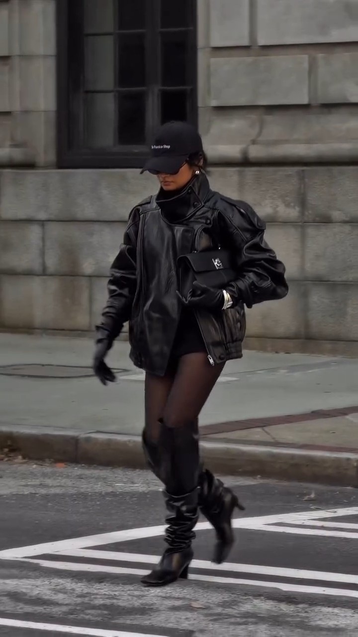 edgy streetwear black leather jacket — puffed shoulders, high collar, zip front, ribbed hem, bomber style