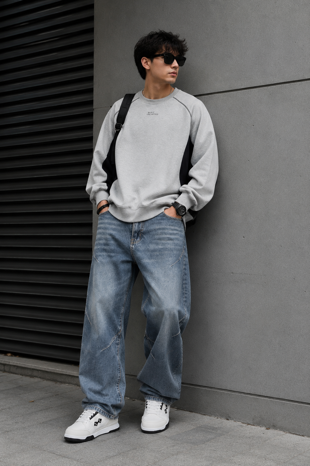 BLAC UNLIMITED light grey sweatshirt — raglan sleeves, black side panels, contrasting grey stitching, ribbed cuffs and hem, 'BLAC UNLIMITED' embroidered text on chest