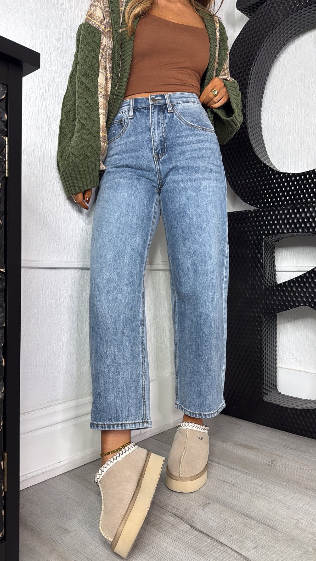 casual light blue wash jeans — traditional 5-pocket, zipper fly, subtle whiskering, cropped length