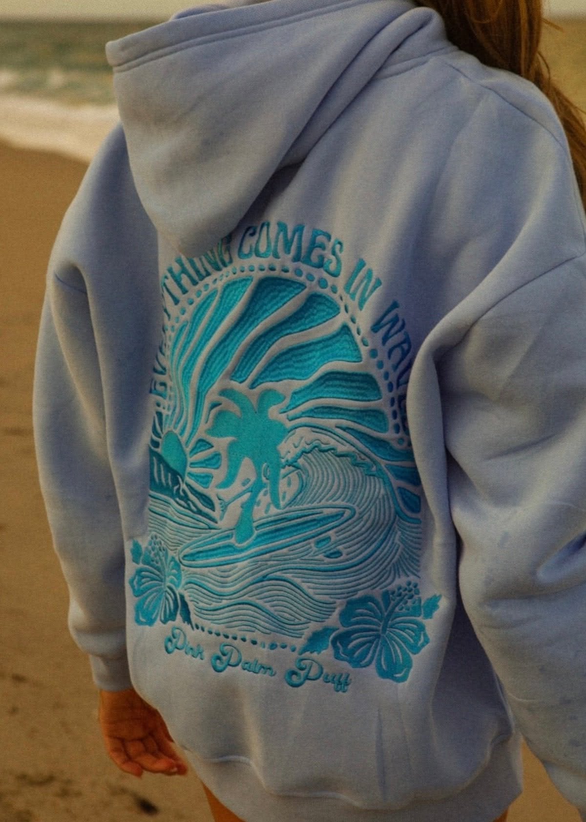 Pink Palm Puff light blue hoodie — hooded, long sleeve, ribbed cuffs and hem, large embroidered graphic on back