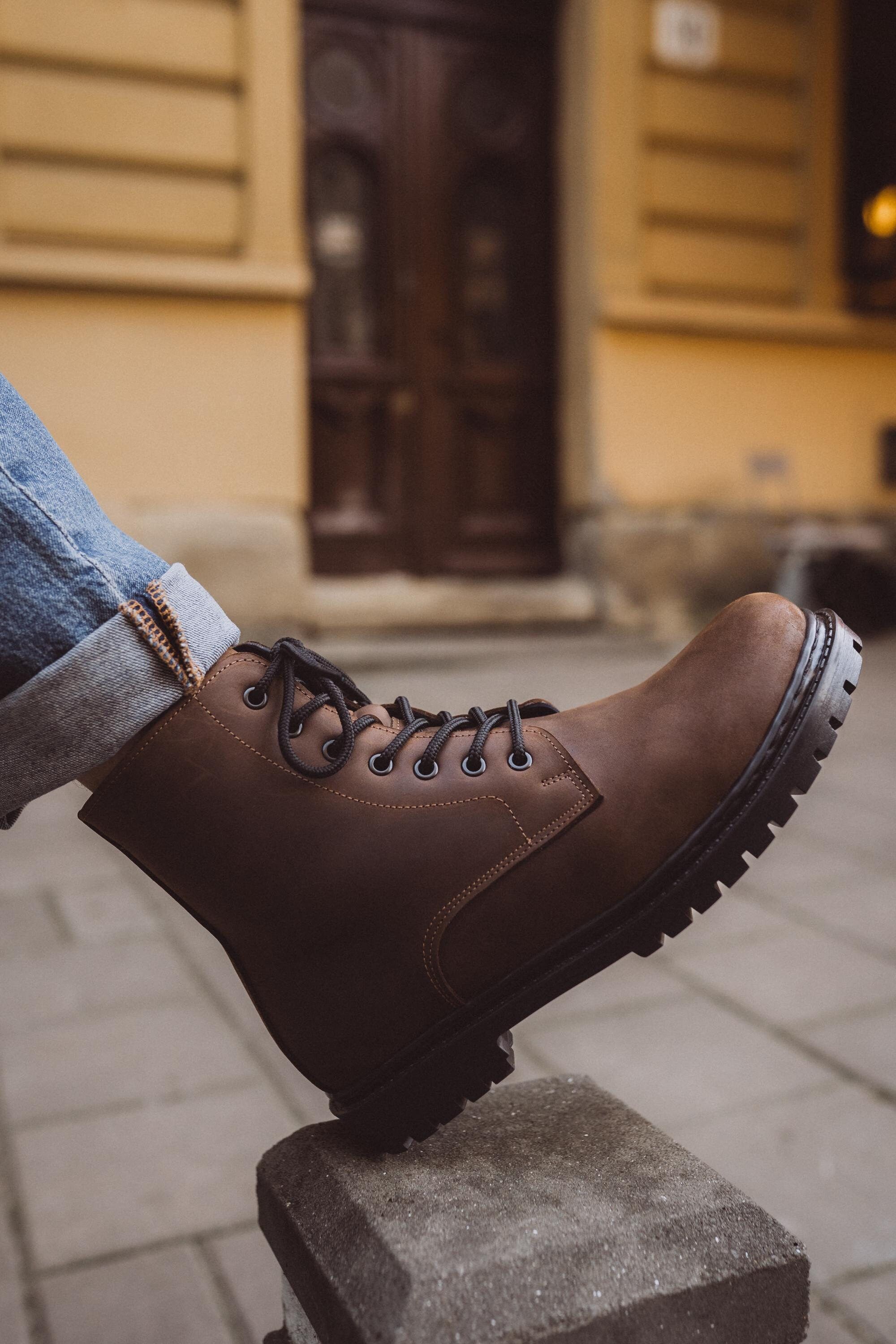 casual dark brown combat boots — lace-up, metal eyelets, contrasting stitching, lug sole