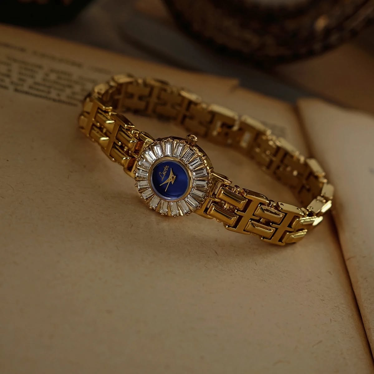 Luxury Gold and Royal Blue Watch — Baguette-cut Clear Stones Bezel