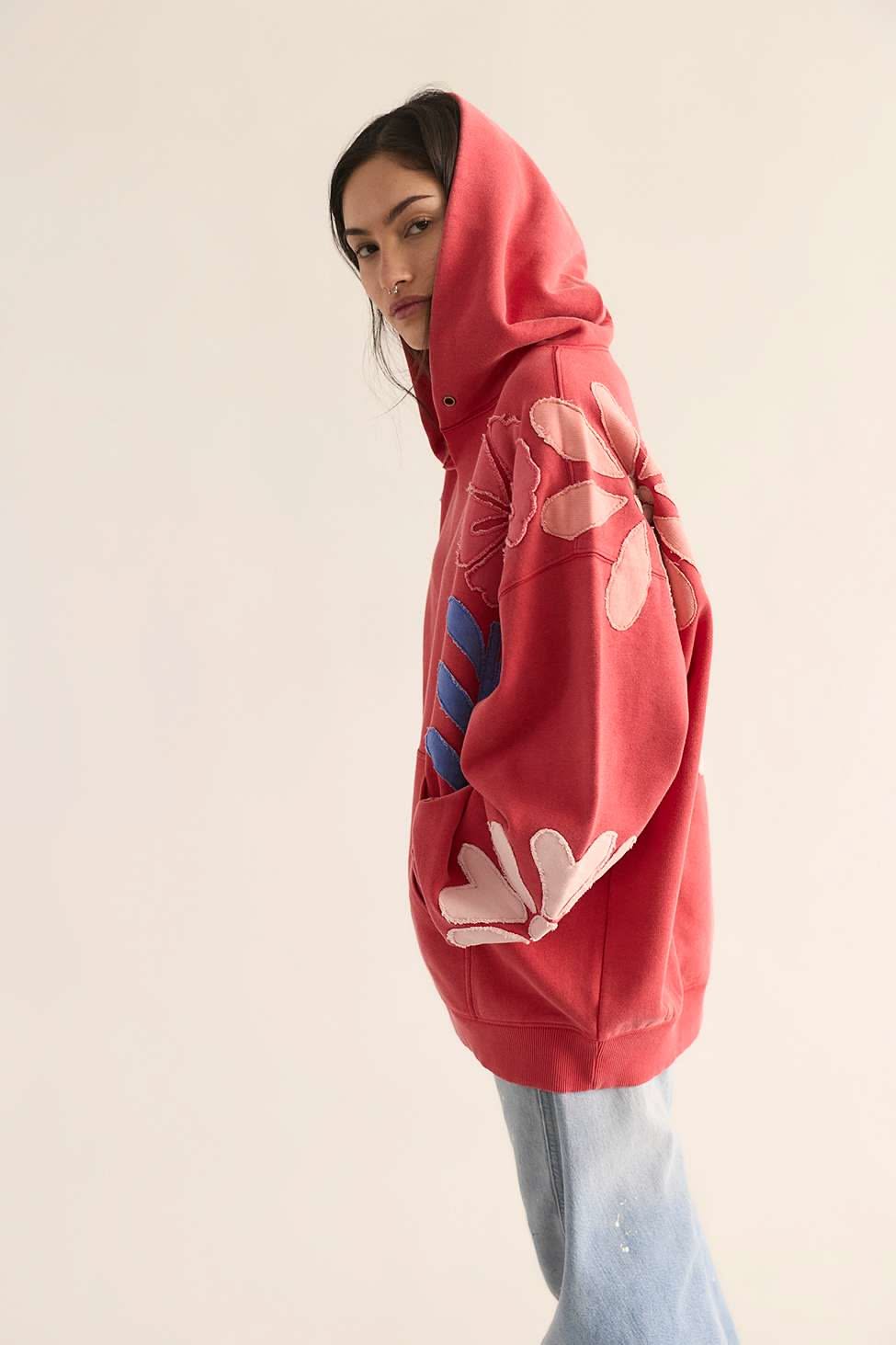 casual faded red hoodie — drawstring hood, kangaroo pocket, raw edge floral appliques, ribbed cuffs and hem
