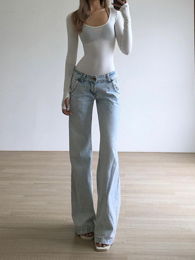 retro light wash blue jeans — low-rise waist, straight leg, relaxed fit, light wash, distressed details on pockets