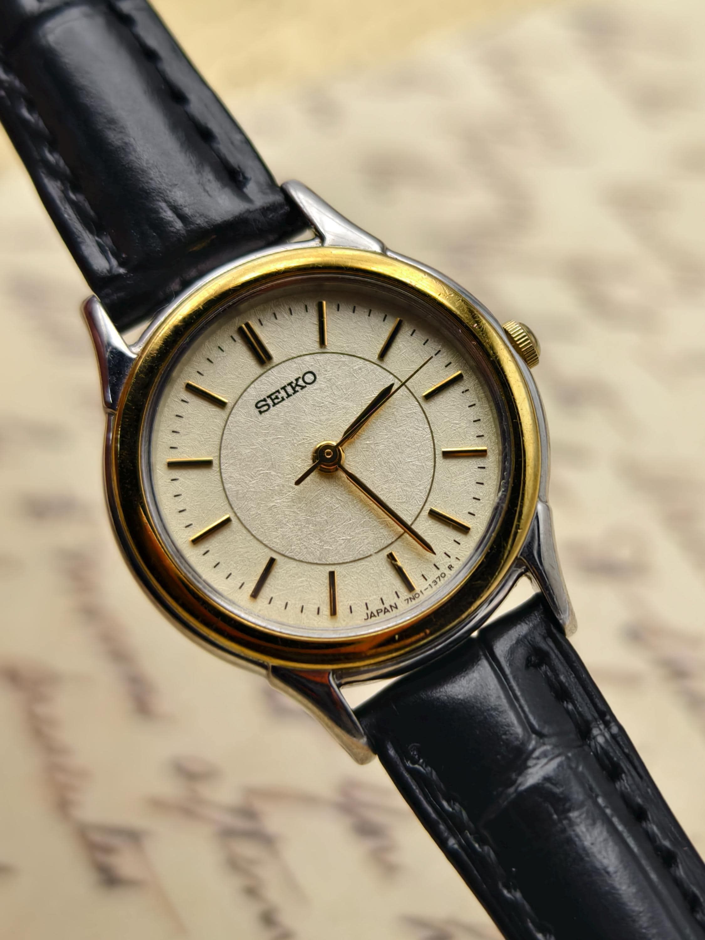 Seiko Two-tone Gold and Silver, Champagne Dial, Black Strap Wrist