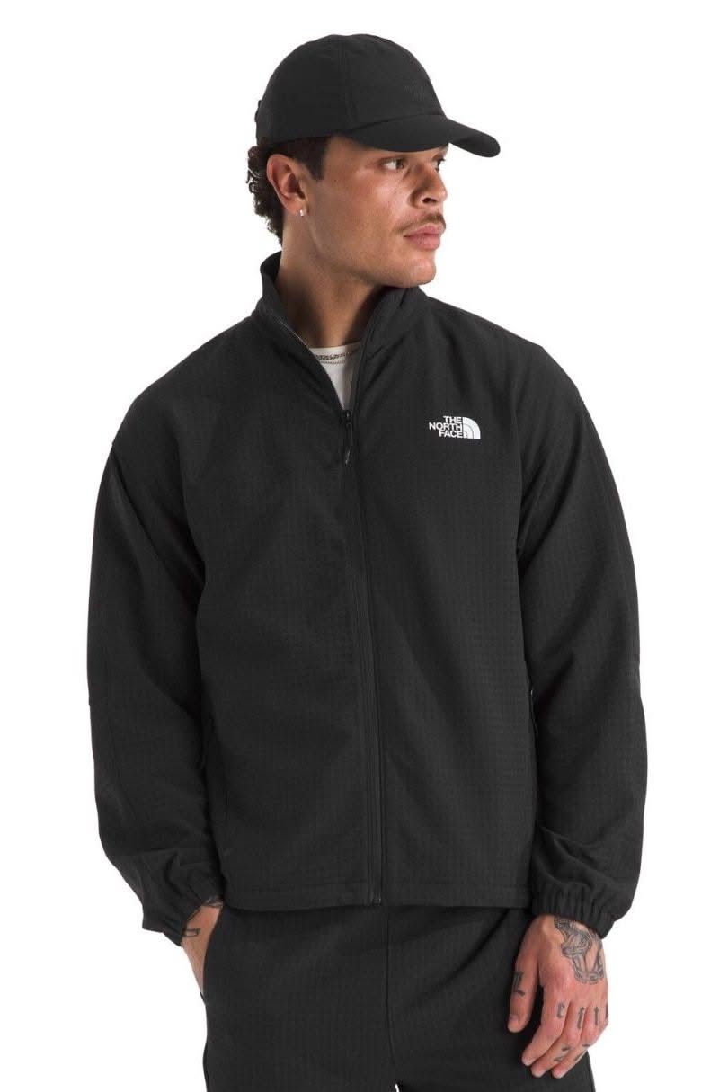 The North Face black track jacket — full zip closure, stand collar, elastic cuffs, white logo on chest