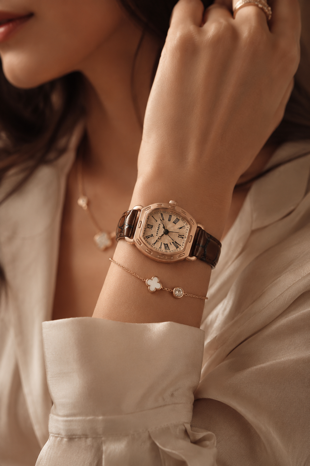 luxury rose gold and dark brown wristwatch — tonneau case, Roman numerals, textured dial, alligator embossed leather strap, crown at 3 o'clock