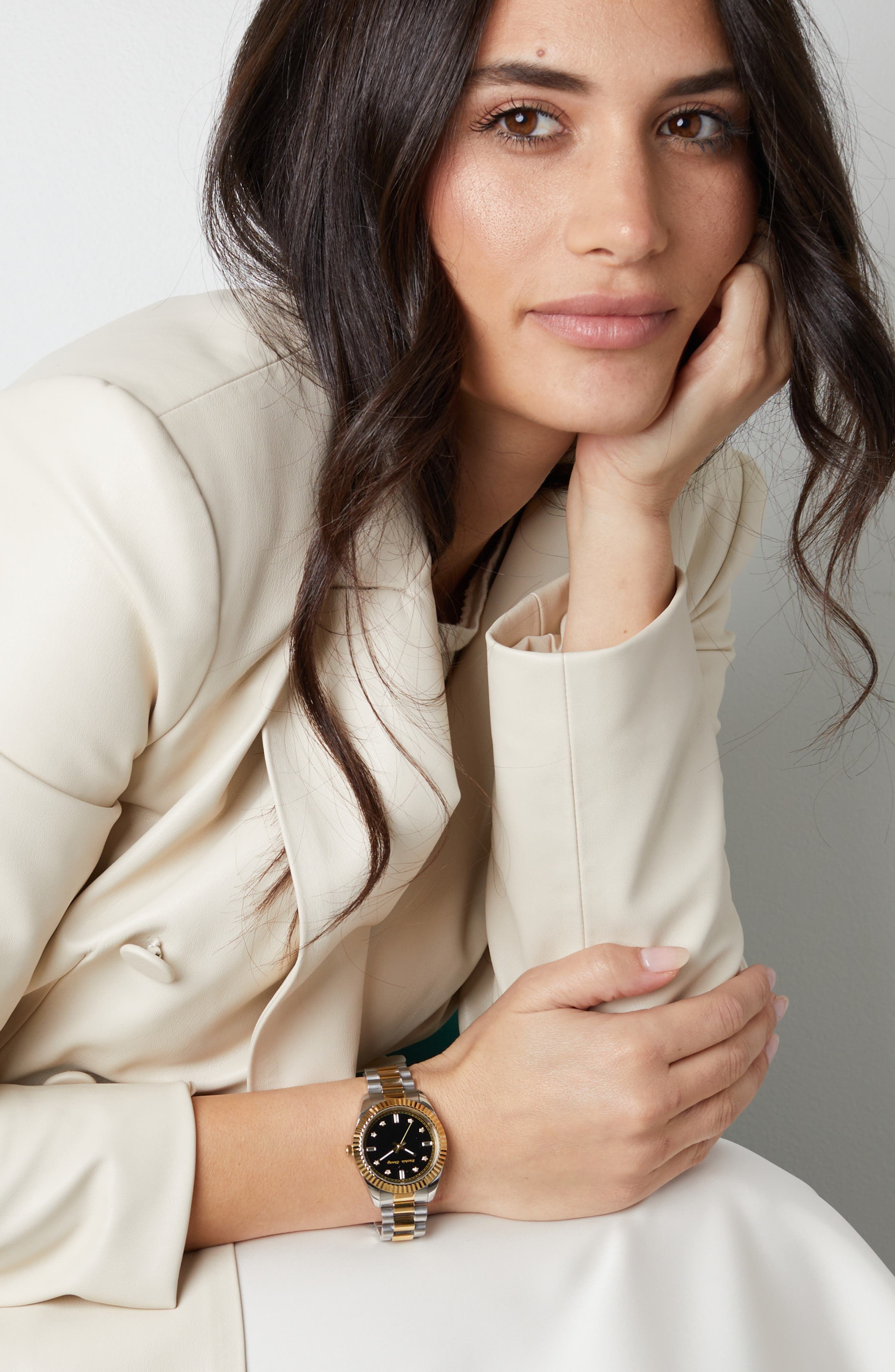 luxury two-tone silver and gold, black dial bracelet watch — round case, fluted bezel, black dial, diamond hour markers, three-hand movement, jubilee bracelet