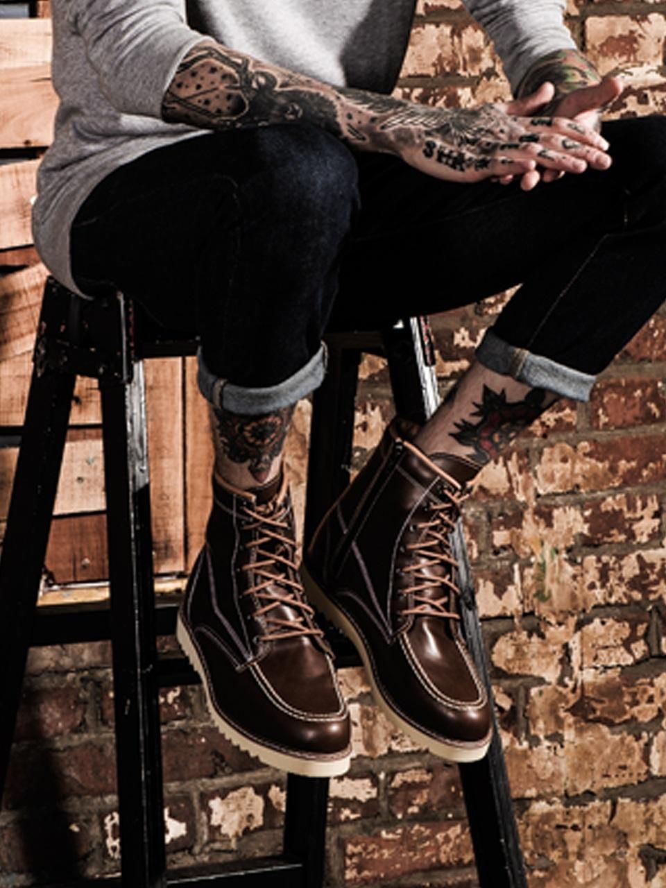 workwear dark brown work boots — moc toe stitching, D-ring eyelets, contrasting white wedge sole, light brown laces