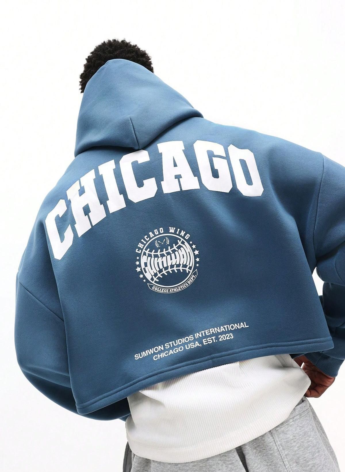 streetwear dark teal blue hoodie — hooded, dropped shoulder, large back graphic print, ribbed hem, kangaroo pocket (implied)