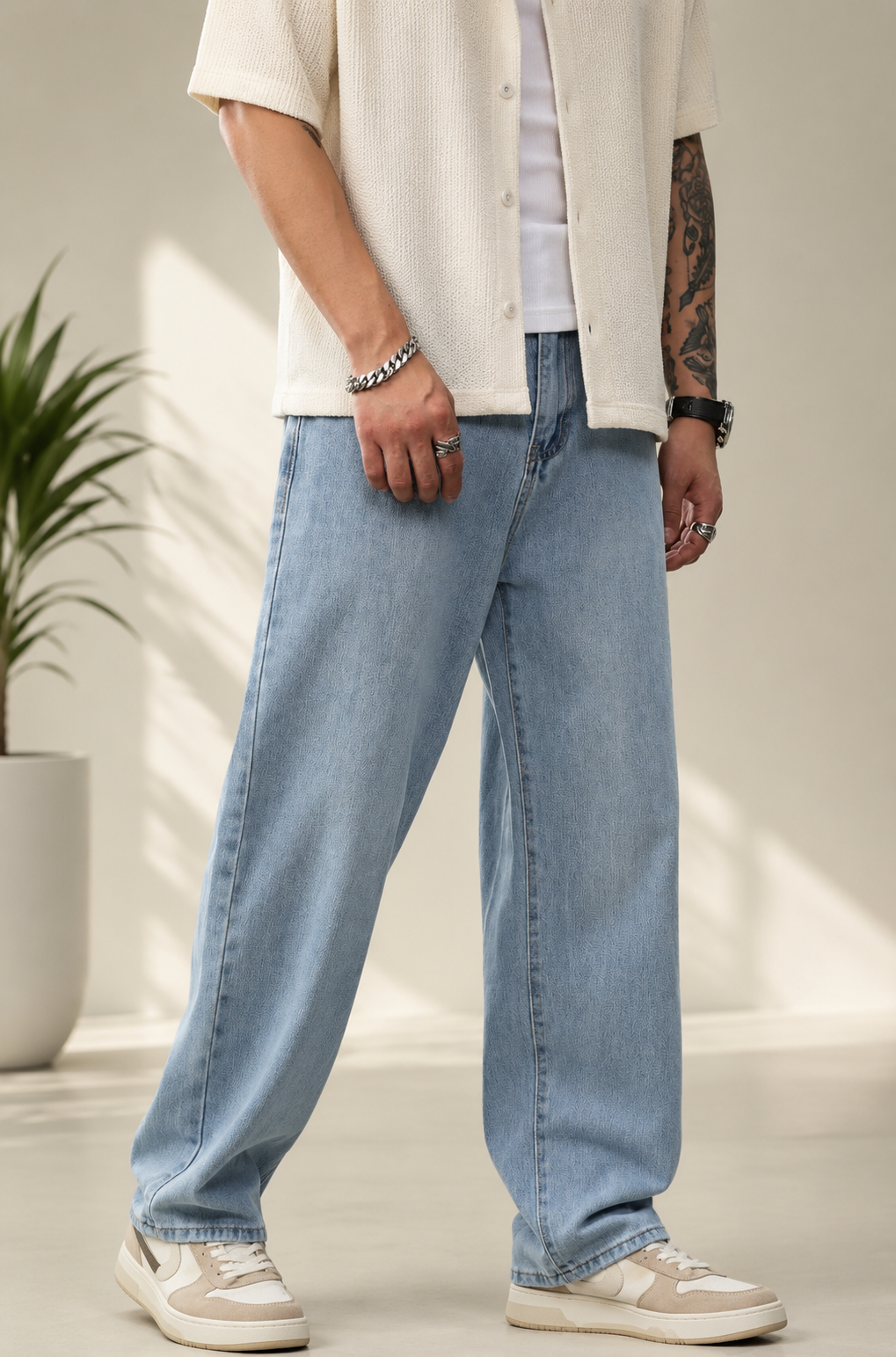 casual light wash blue jeans — classic five-pocket style, straight hem
