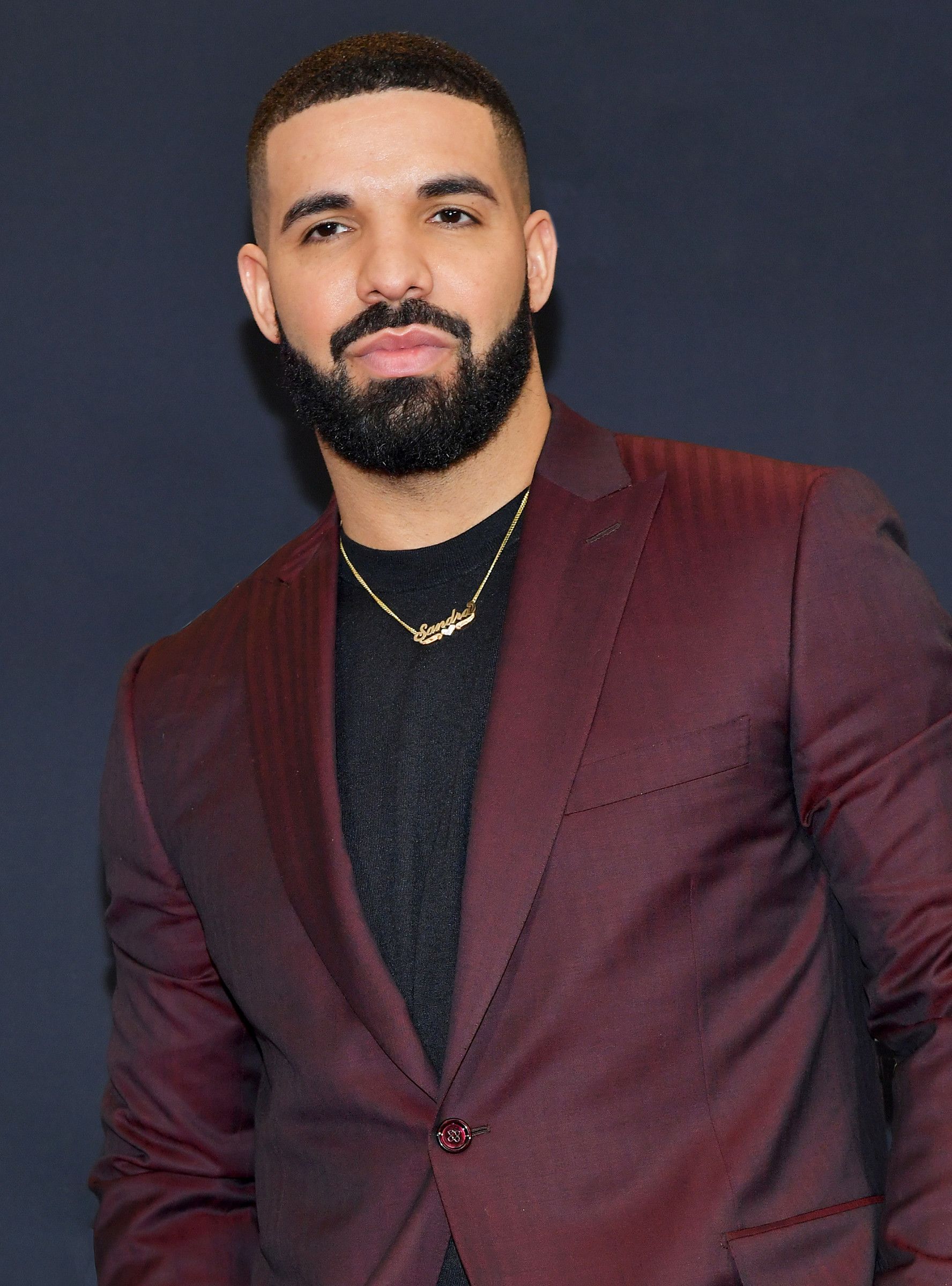 Drake burgundy blazer — peak lapel, single-breasted, single button closure, flap pockets