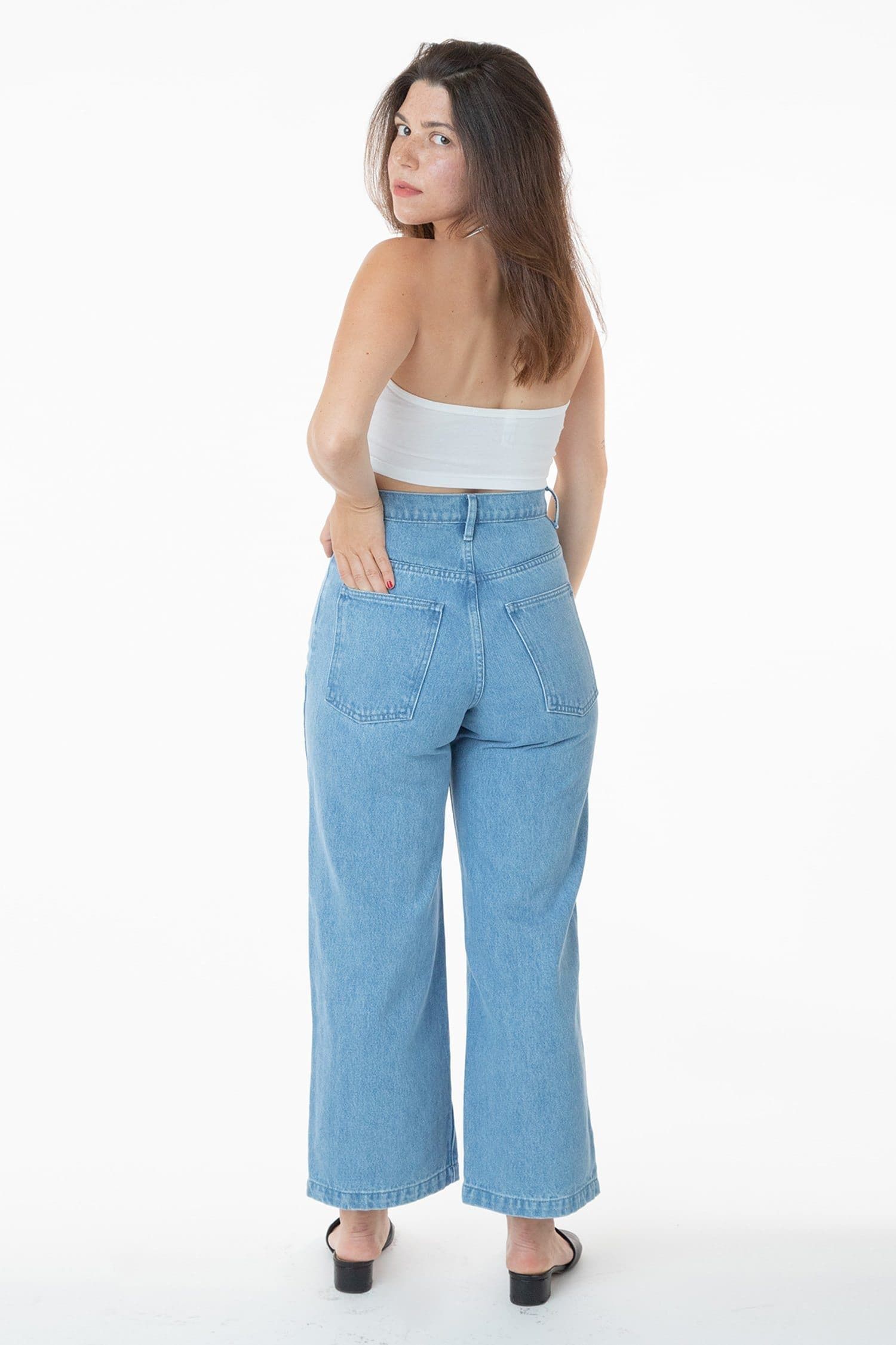 casual light wash blue jeans — five-pocket style, belt loops