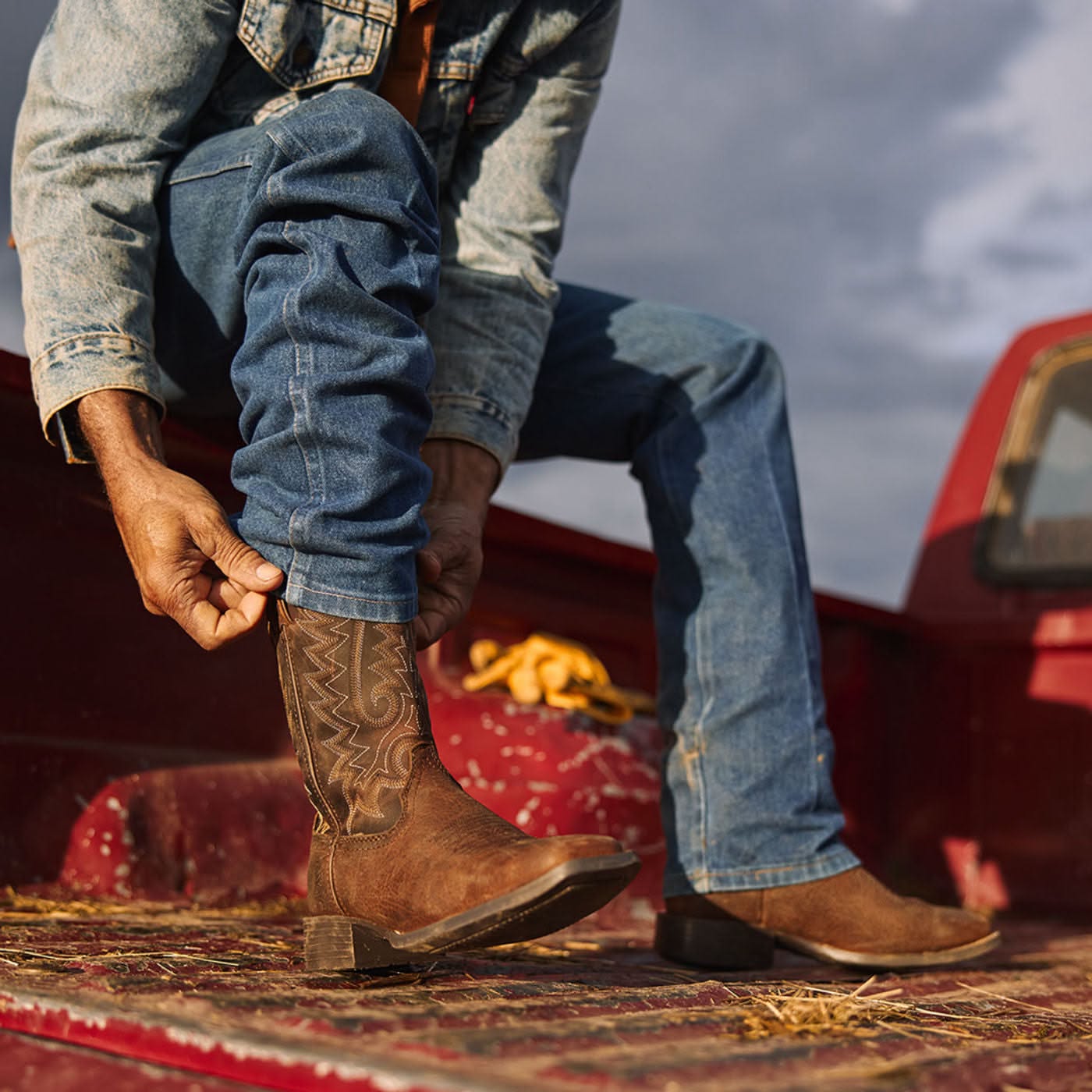 western distressed brown cowboy boots — square toe, stacked heel, contrast embroidered shaft, pull tabs