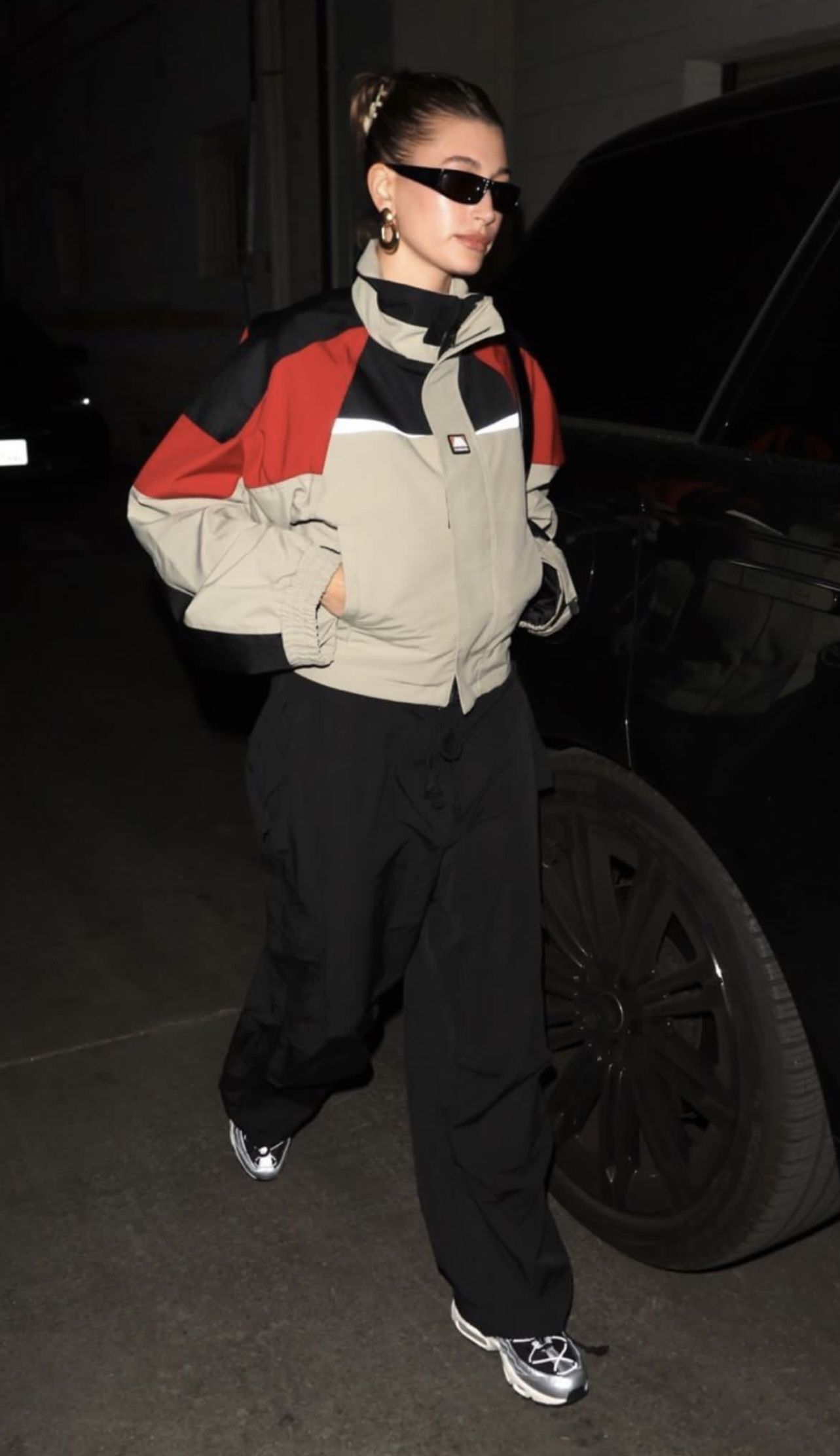 Hailey Bieber Beige, Black, and Red Colorblock Windbreaker Jacket
