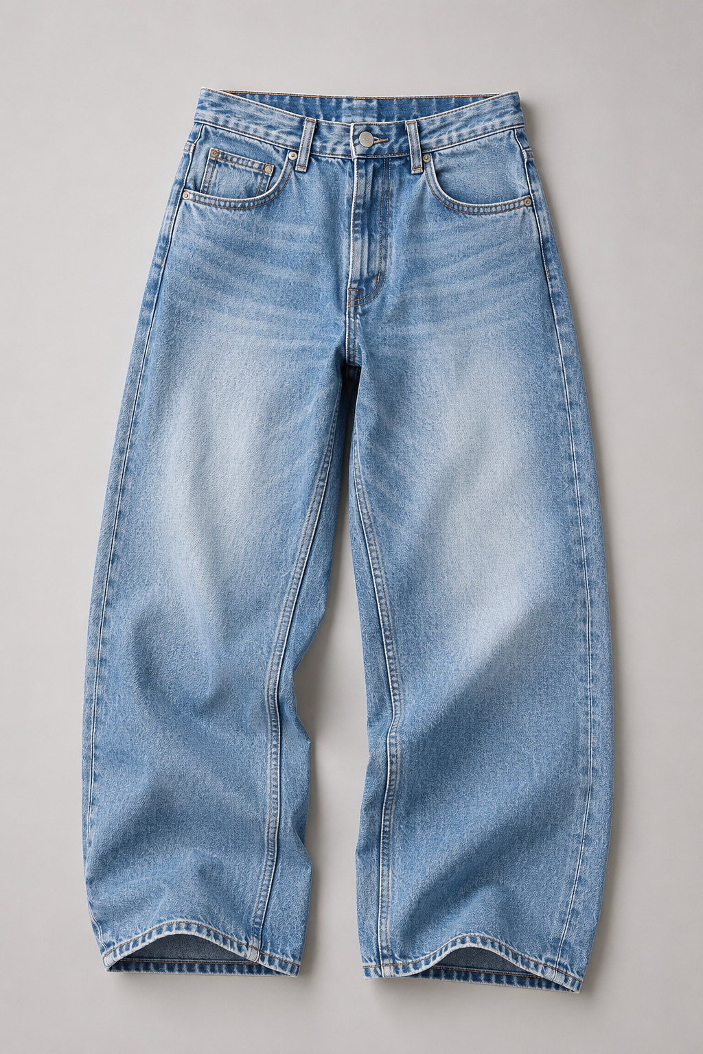 streetwear light wash blue jeans — faded wash, five-pocket style, rivet details