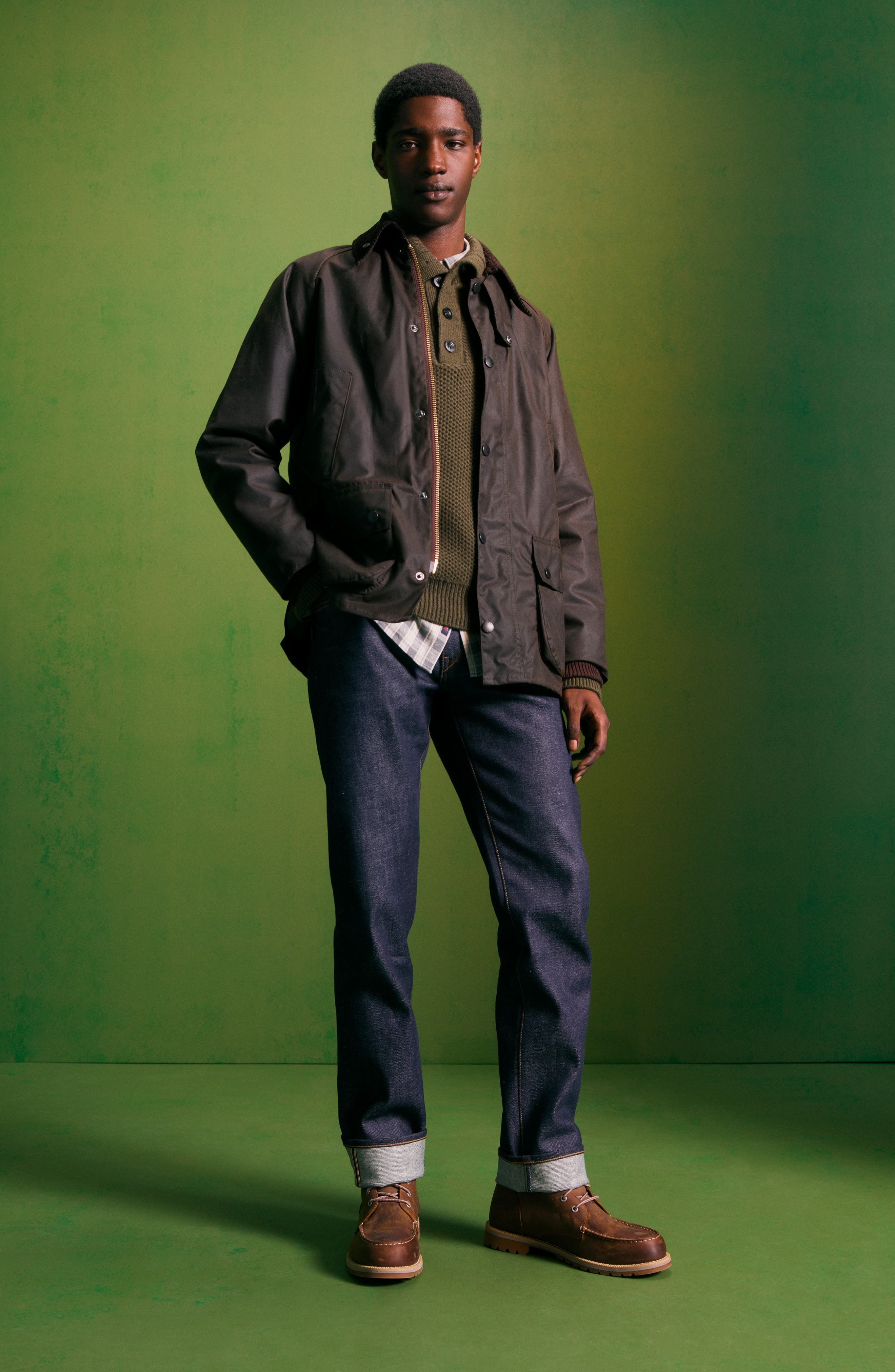 casual dark olive brown waxed cotton jacket — corduroy collar, two-way zipper, snap-button storm flap, multiple flap pockets, ribbed cuffs