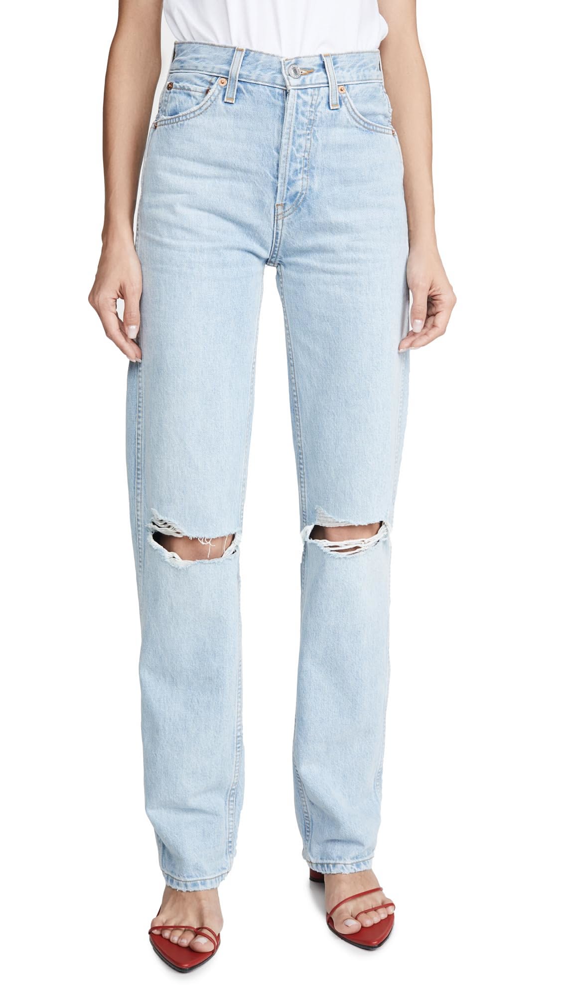 RE/DONE light wash blue jeans — ripped knees, button fly, five-pocket style
