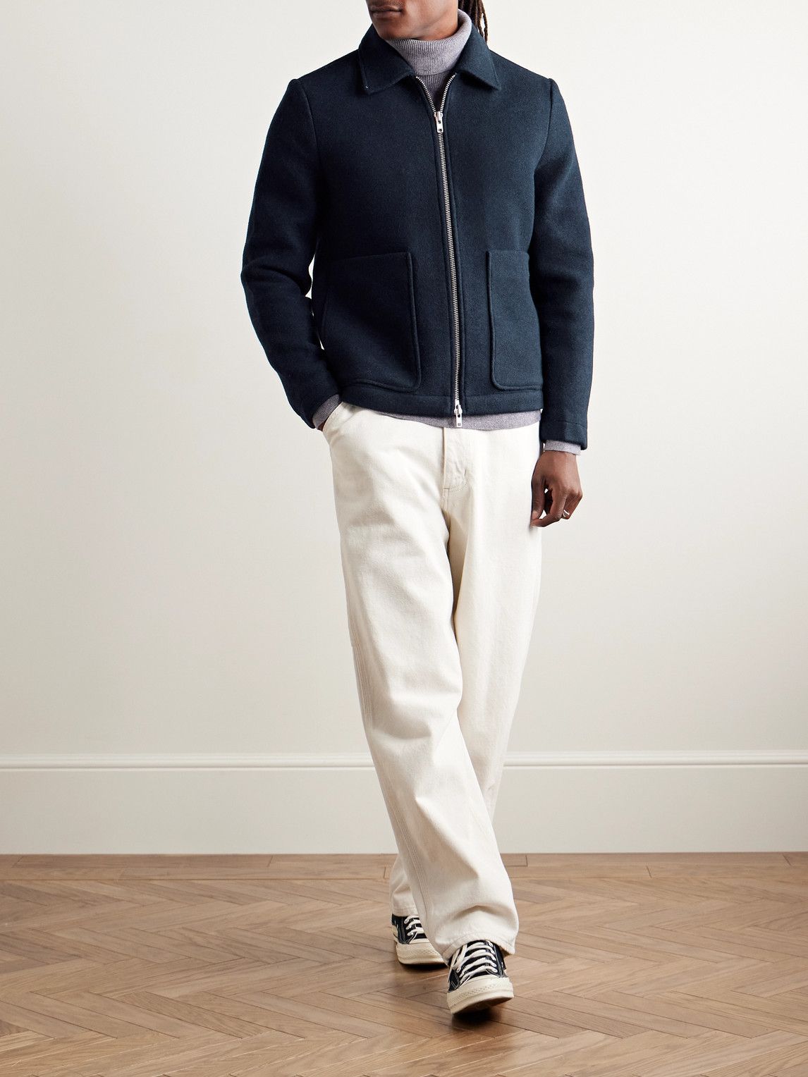 minimalist navy blue bomber jacket — silver-tone zip closure, spread collar, two large patch pockets