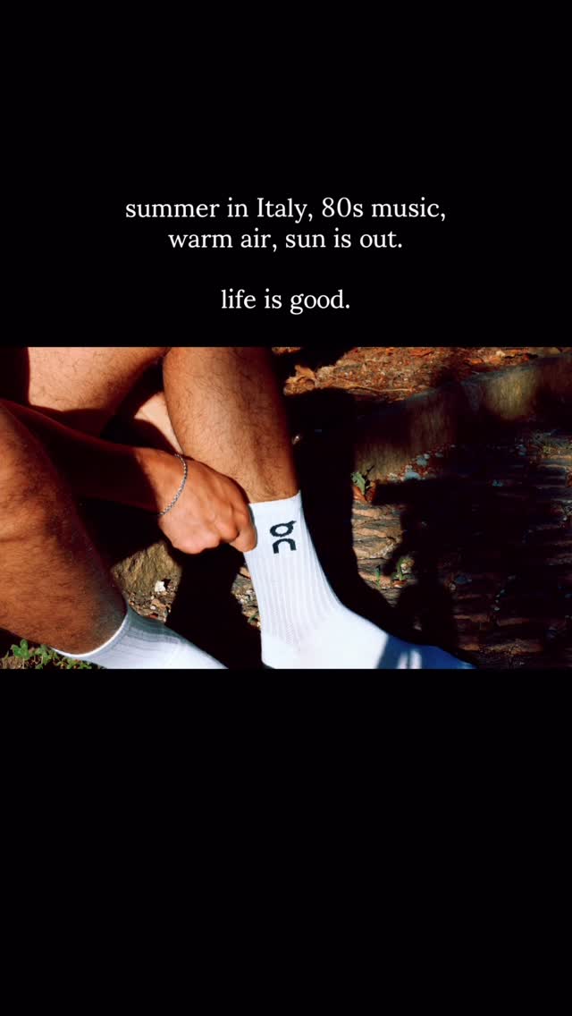 On Running white socks — ribbed cuff, black brand logo on side