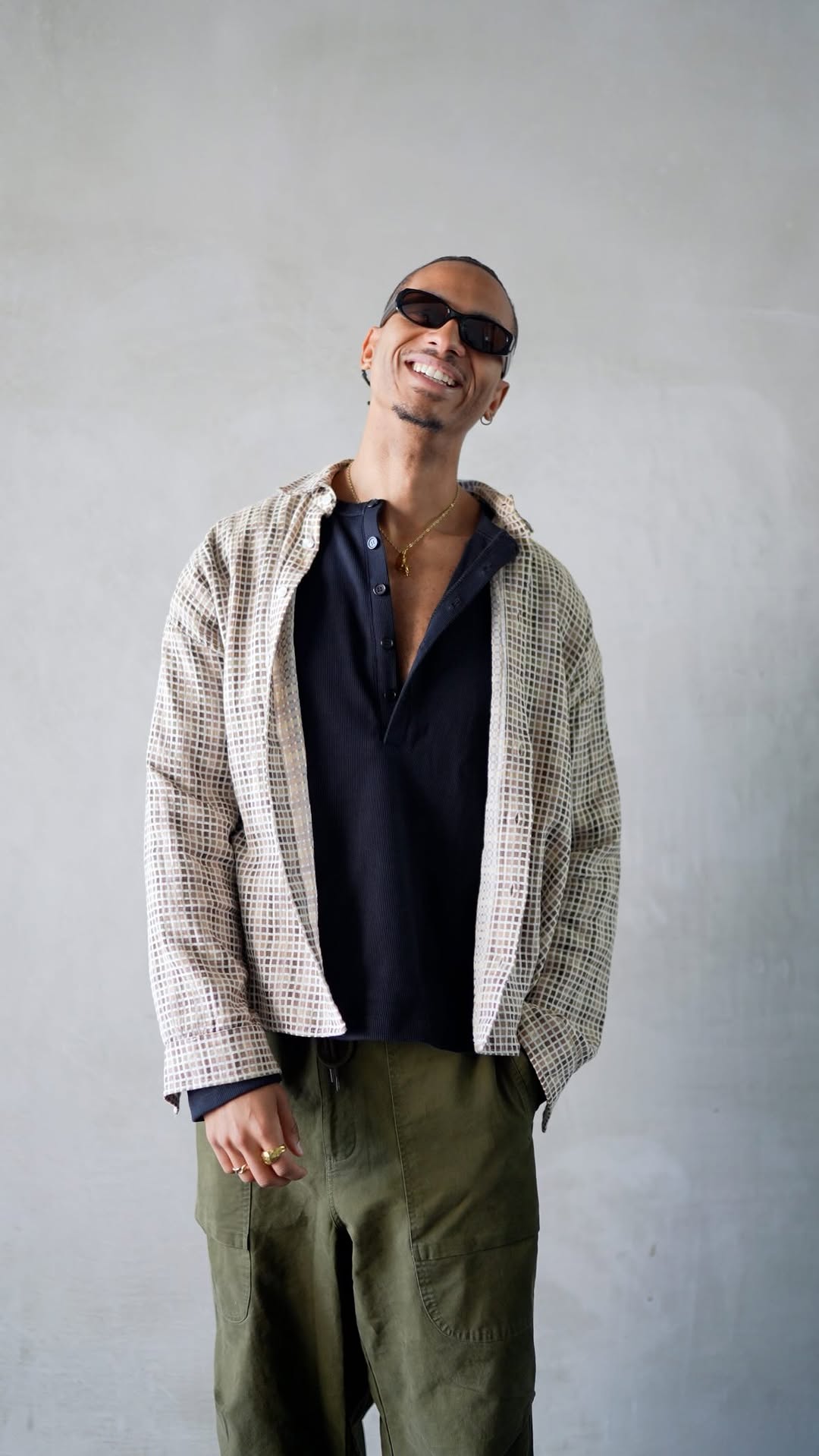 casual beige and brown overshirt — button-up front, spread collar, dropped shoulders, slightly cropped hem