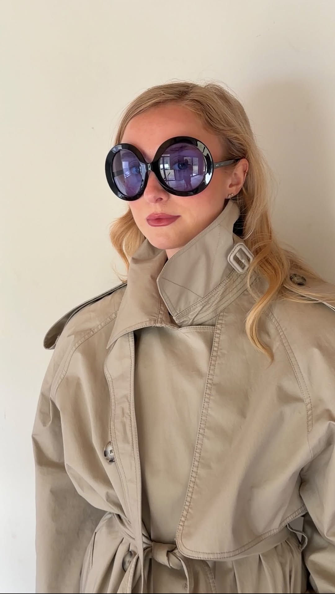 classic beige khaki trench coat — wide collar, shoulder epaulets, storm flap, belted waist